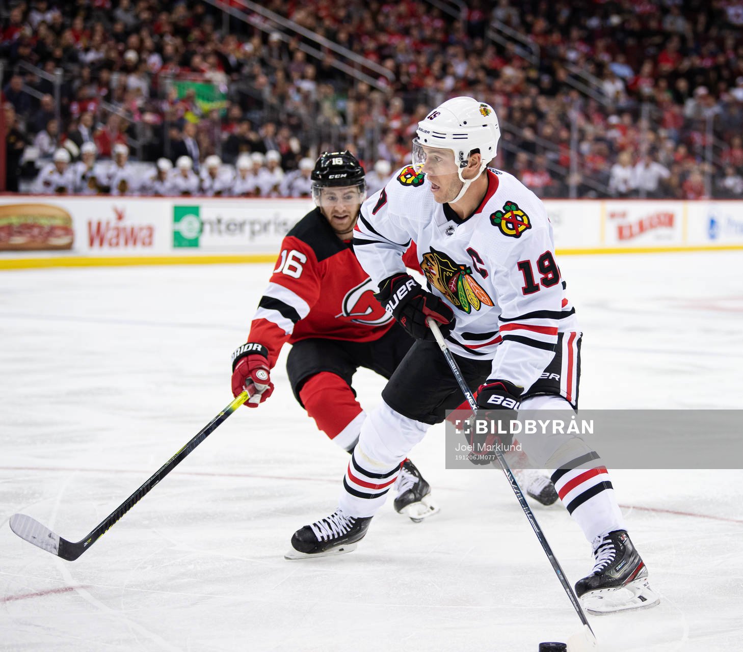 New Jersey Devils Kevin Rooney and Chicago Blackhawks