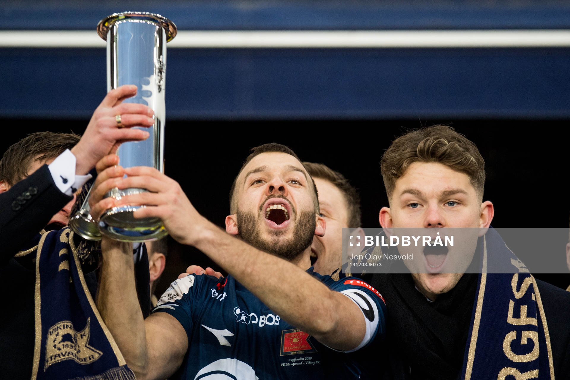 Zlatko Tripic of Viking celebrates with the trophy