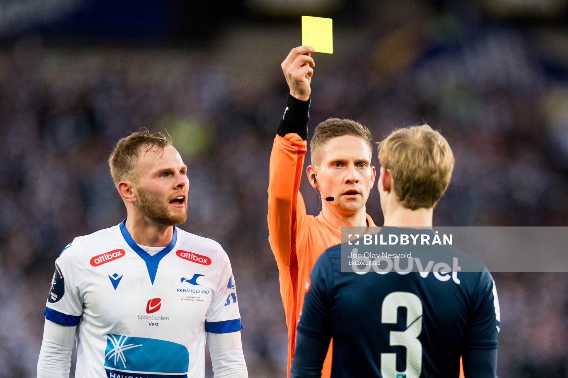 Viljar Helland Vevatne of Viking is shown a yellow card by