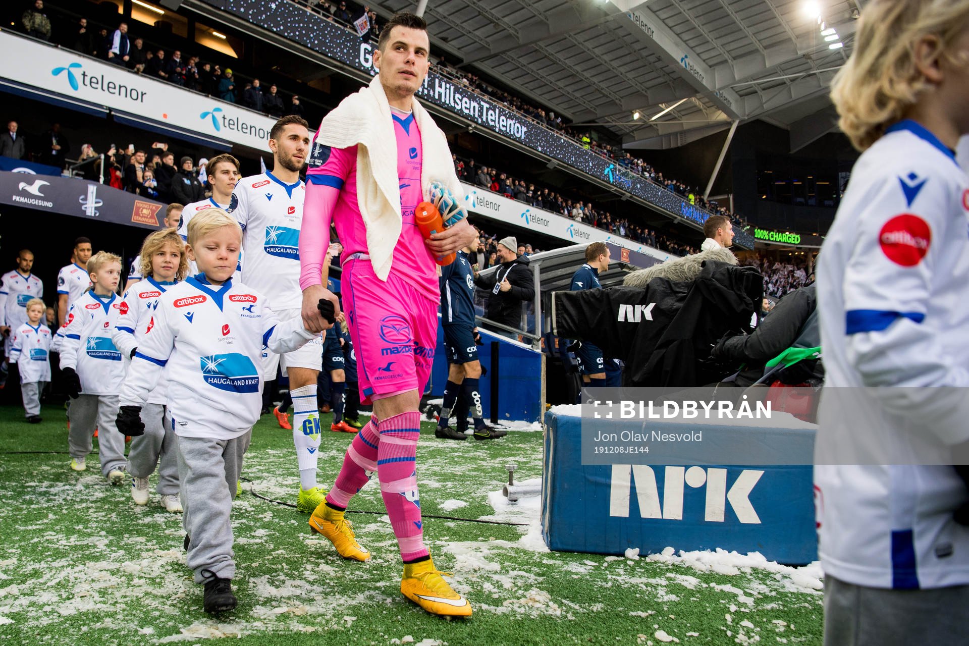 Goalkeeper Helge Sandvik of Haugesund enters the pitch