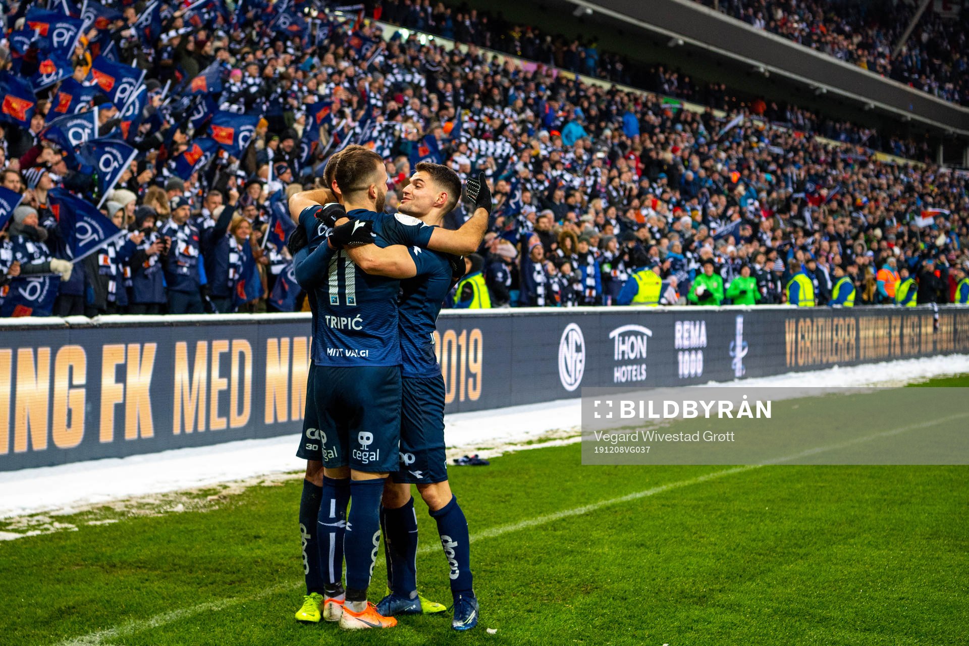 Zlatko Tripic and Ylldren Ibrahimaj of Viking celebrates