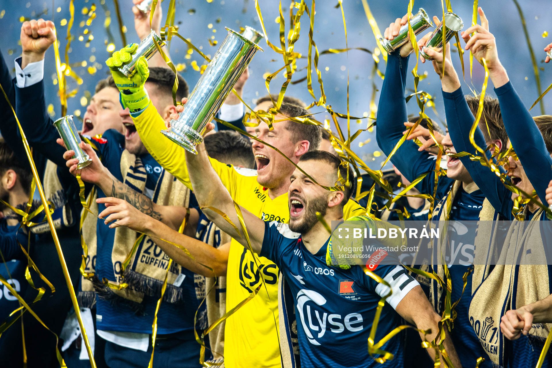 Zlatko Tripic of Viking celebrates with the trophy