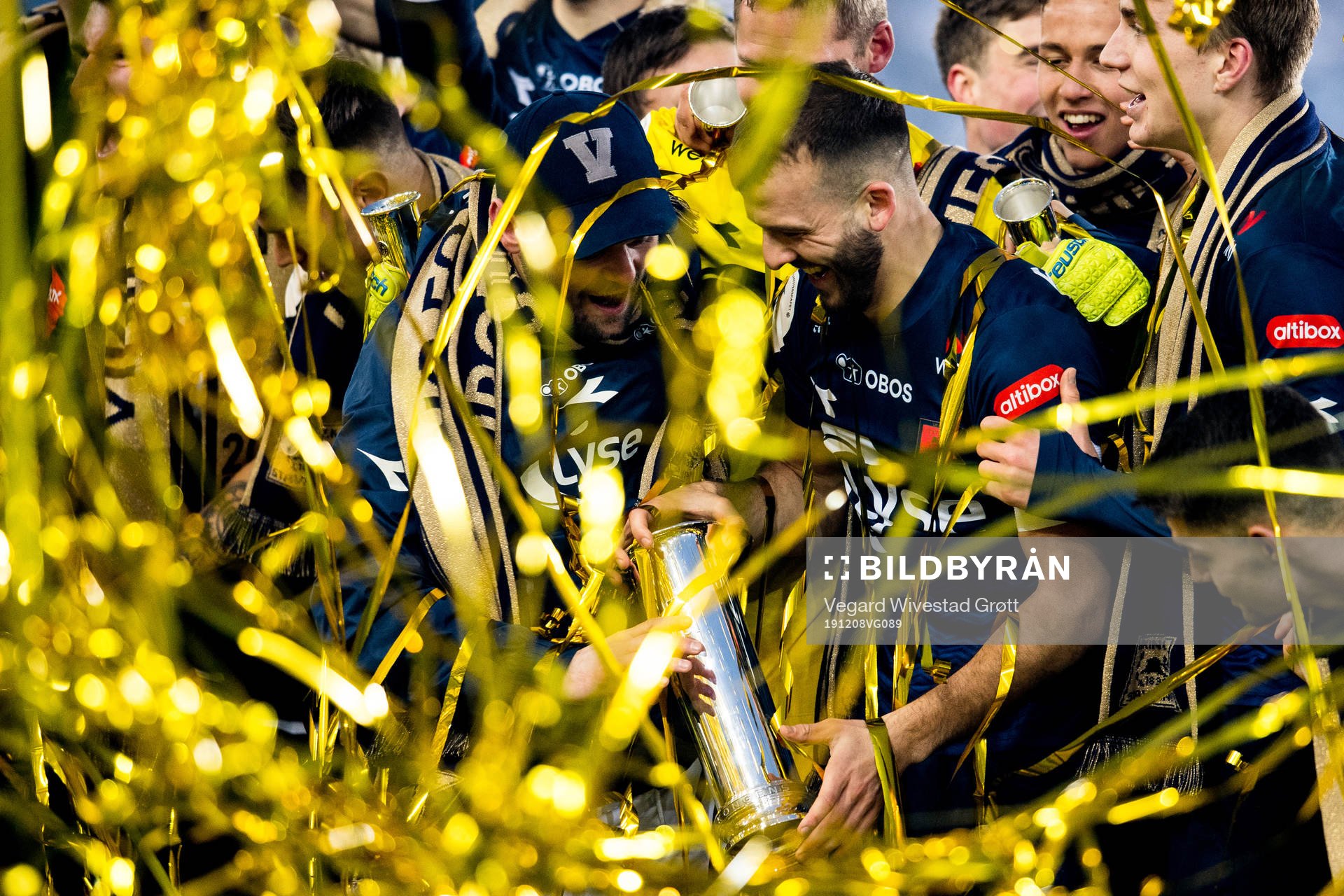 Zlatko Tripic of Viking celebrates with the trophy