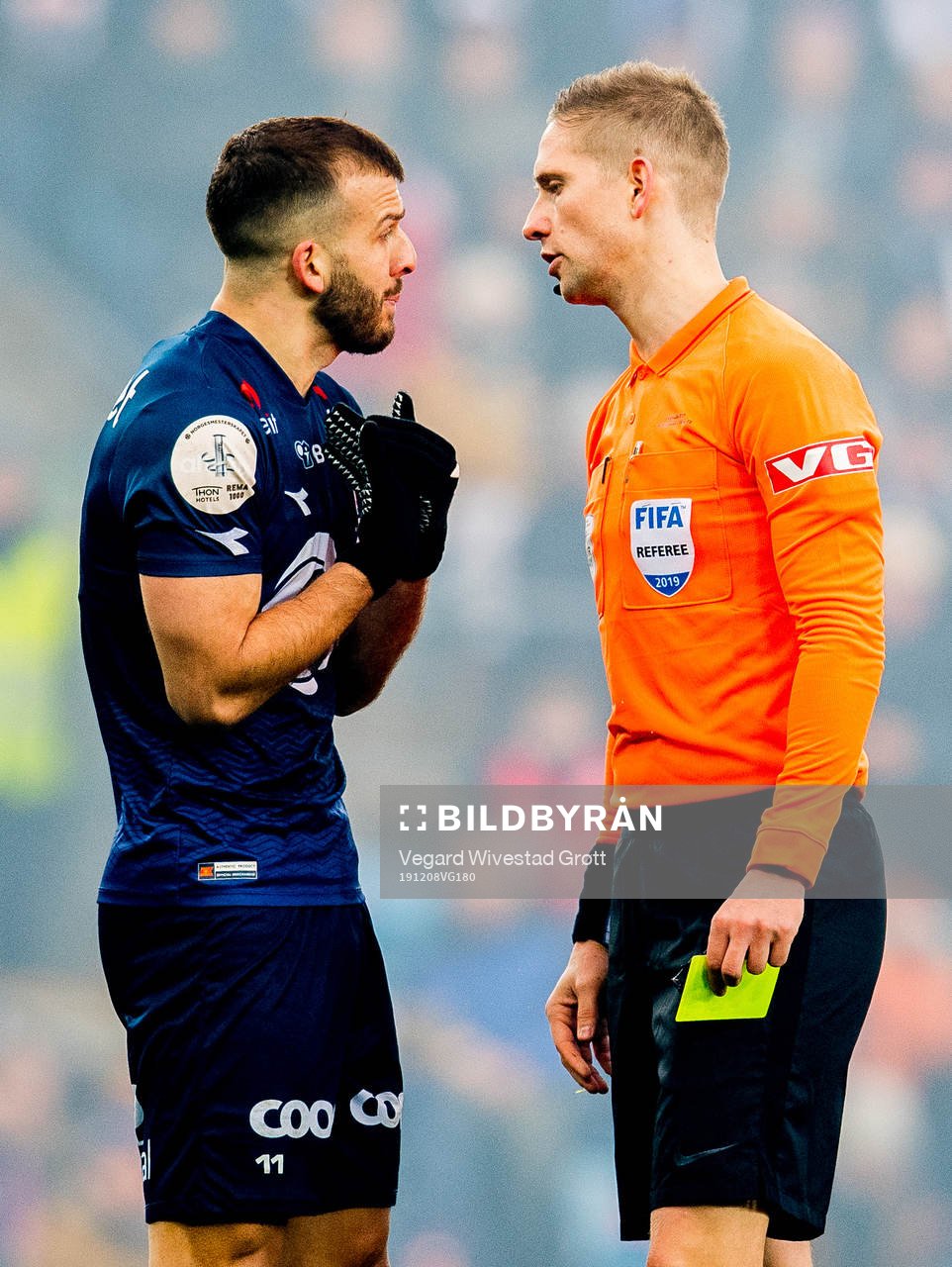 Zlatko Tripic of Viking gets a yellow card from Espen