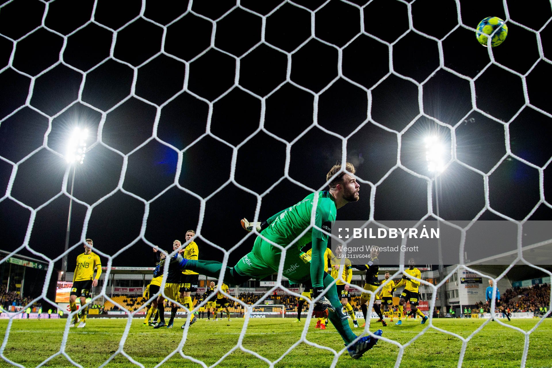Martin Ramsland of Start scores 4-1 behind goalkeeper Marko