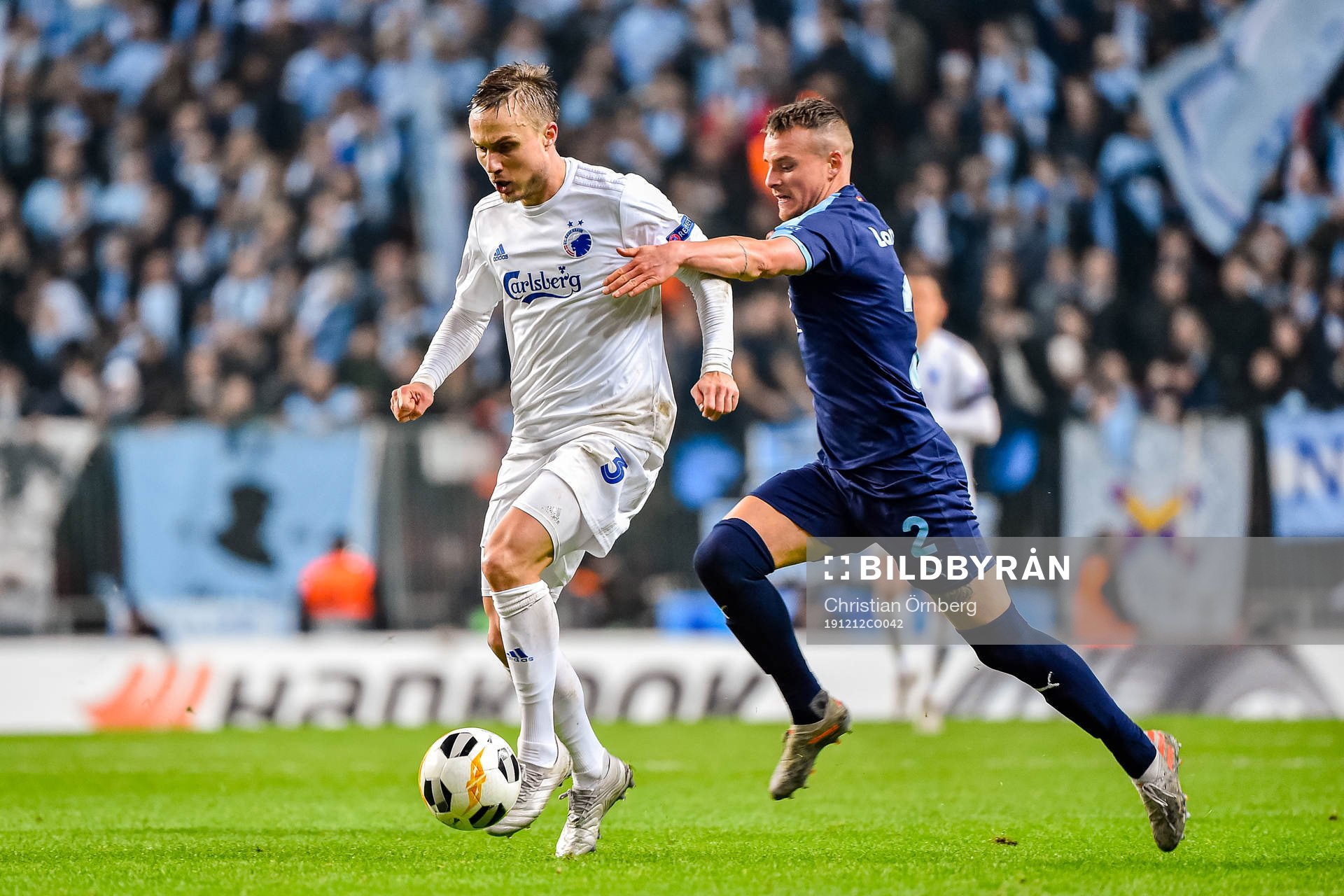 Pierre Bengtsson of FC Köpenhamn and Eric Larsson of