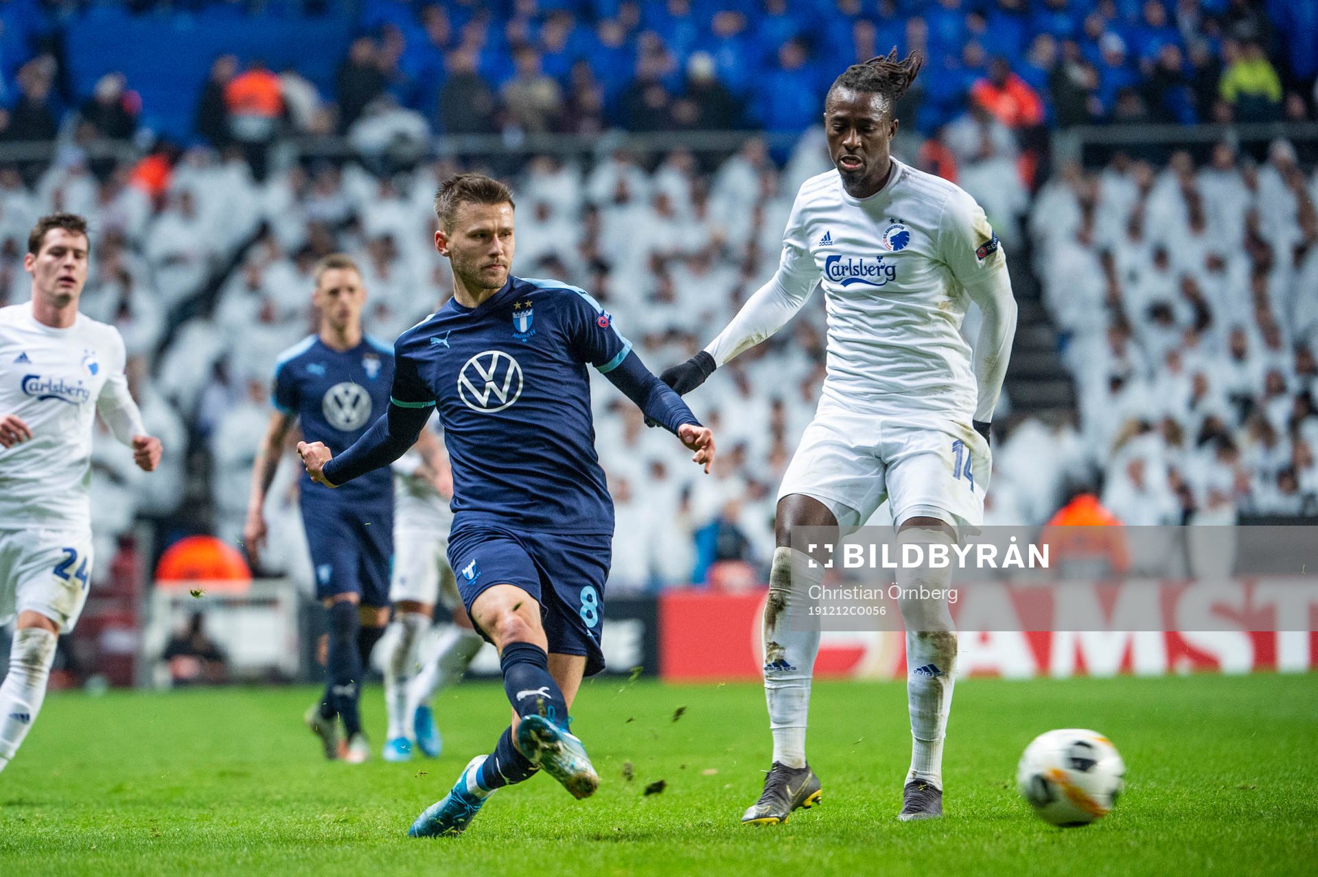 Arnor Traustason of Malmö FF and Dame N'Doye of FC