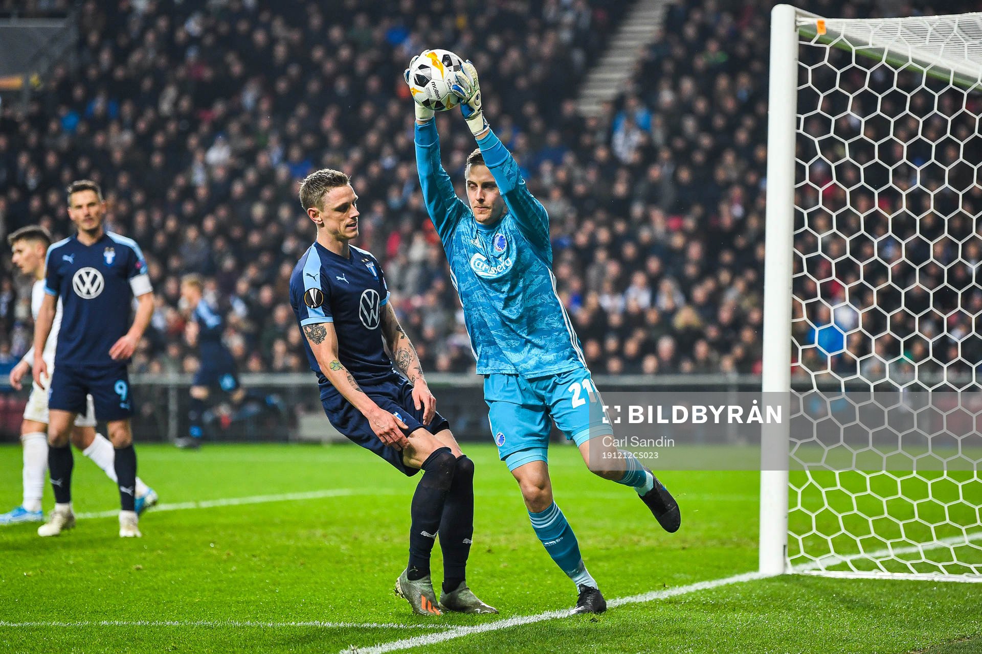 Sören Rieks of Malmö FF and goalkeeper Karl-Johan