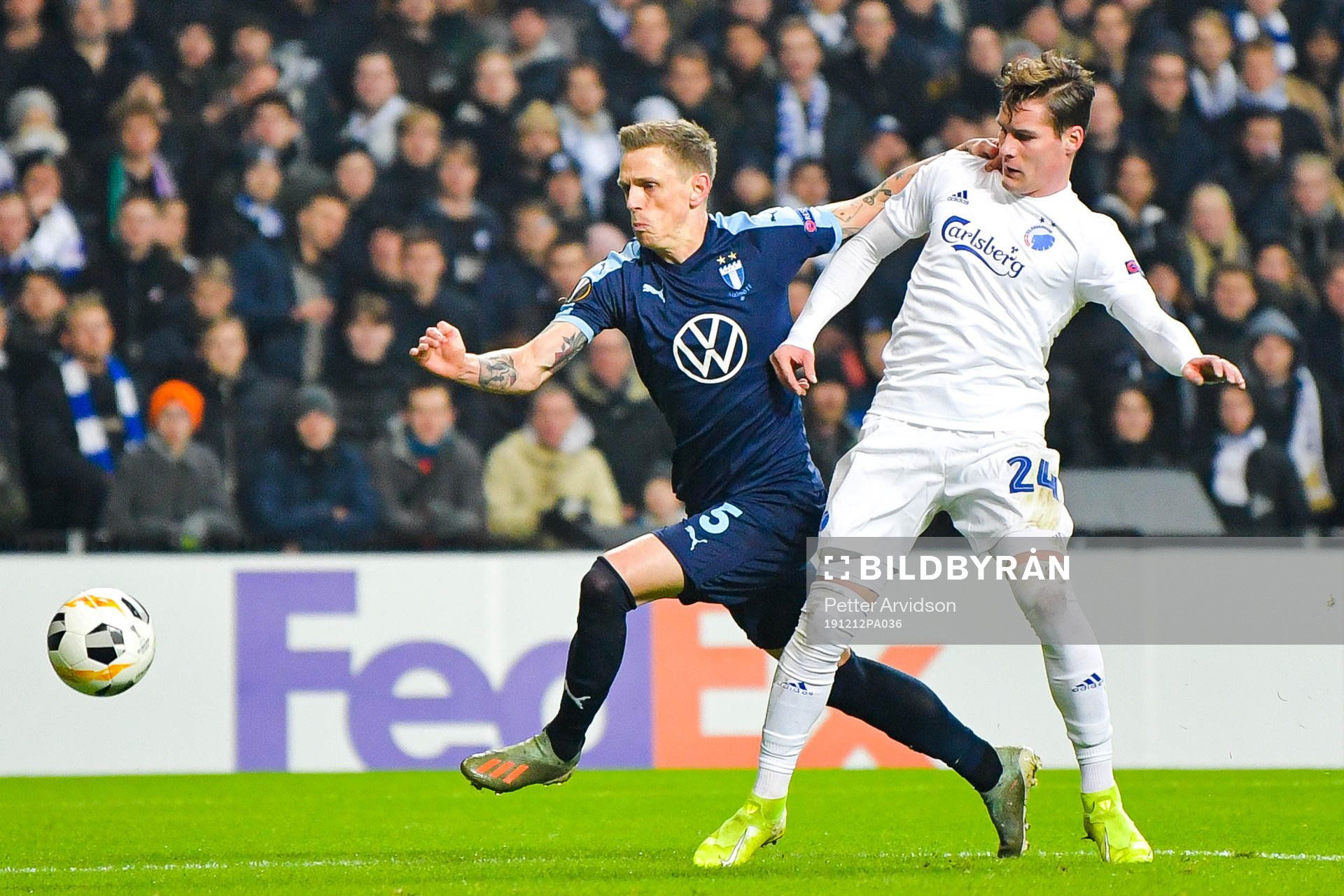 Sören Rieks of Malmö FF against and Robert Mudrazija of