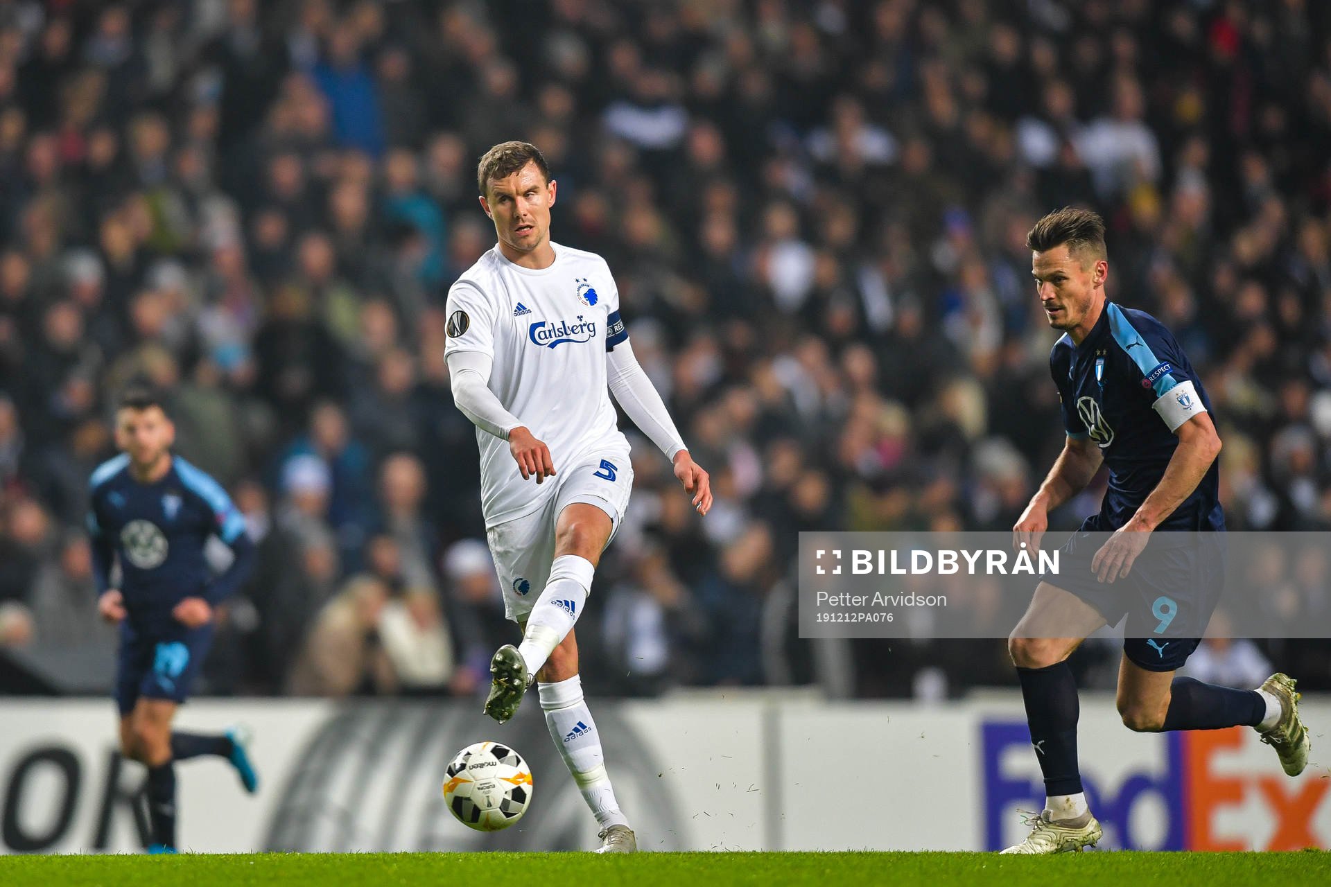 Andreas Bjelland of FC Köpenhamn and Markus Rosenberg of