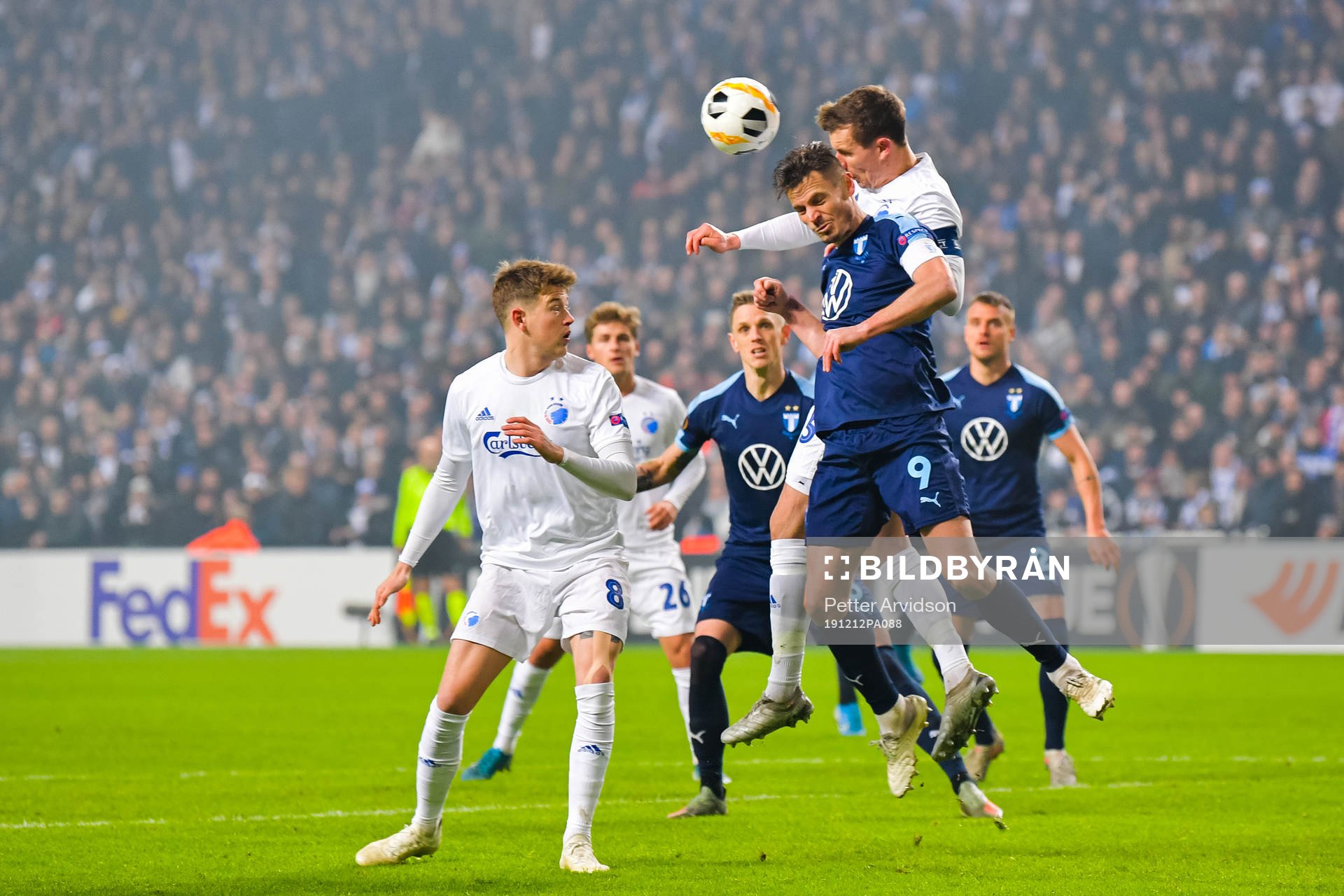 Andreas Bjelland of FC Köpenhamn and Markus Rosenberg of