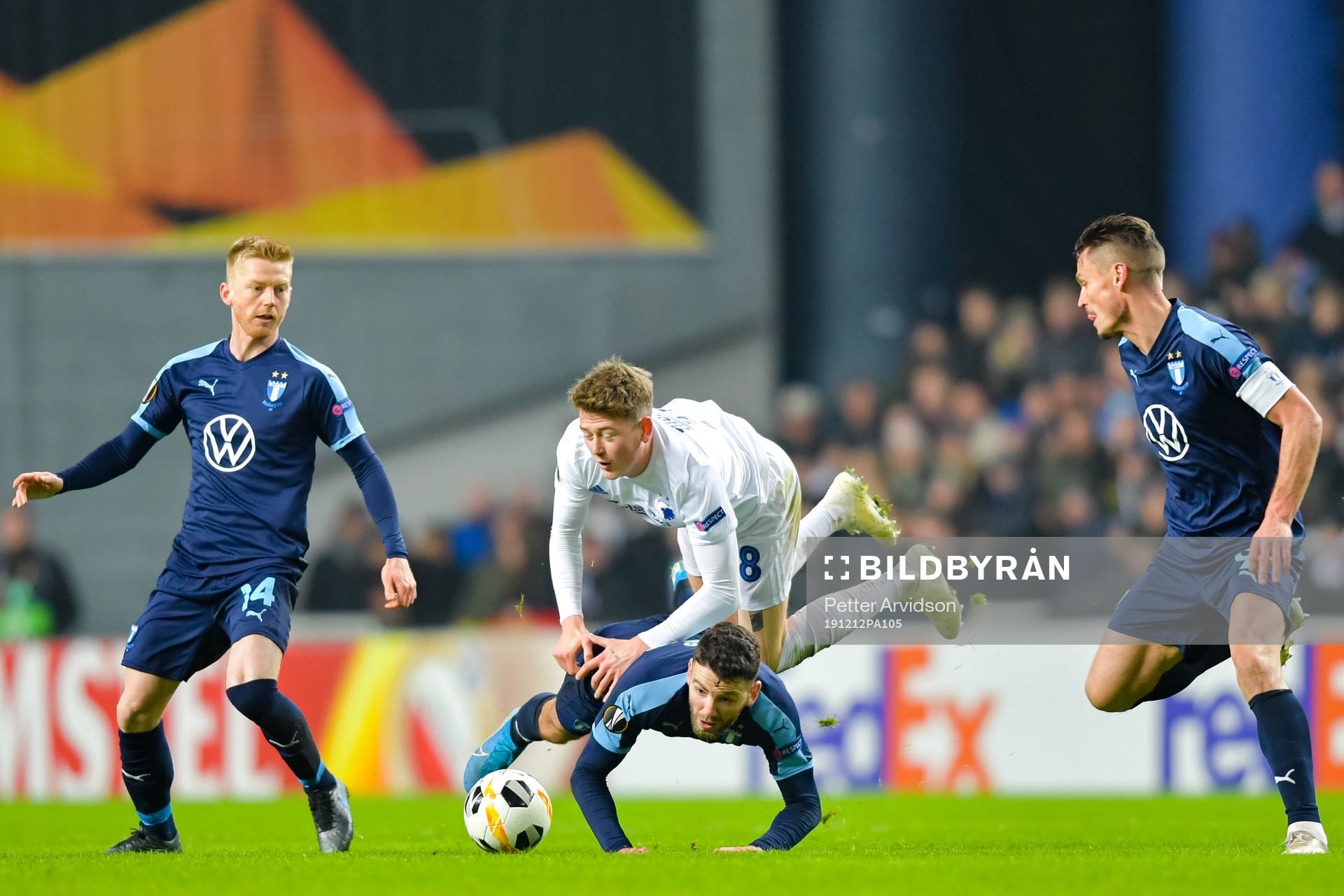 Nicolaj Thomsen of FC Köpenhamn against Anders Christiansen, Erdal Rakip and Markus Rosenberg of Malmö FF during the Europa League match between FC Köpenhamn and Malmö FF on December 12, 2019 in Copenhagen.