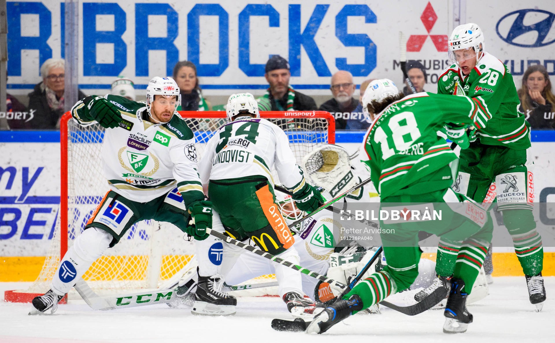 Färjestads målvakt Markus Svensson, Michael Lindqvist och
