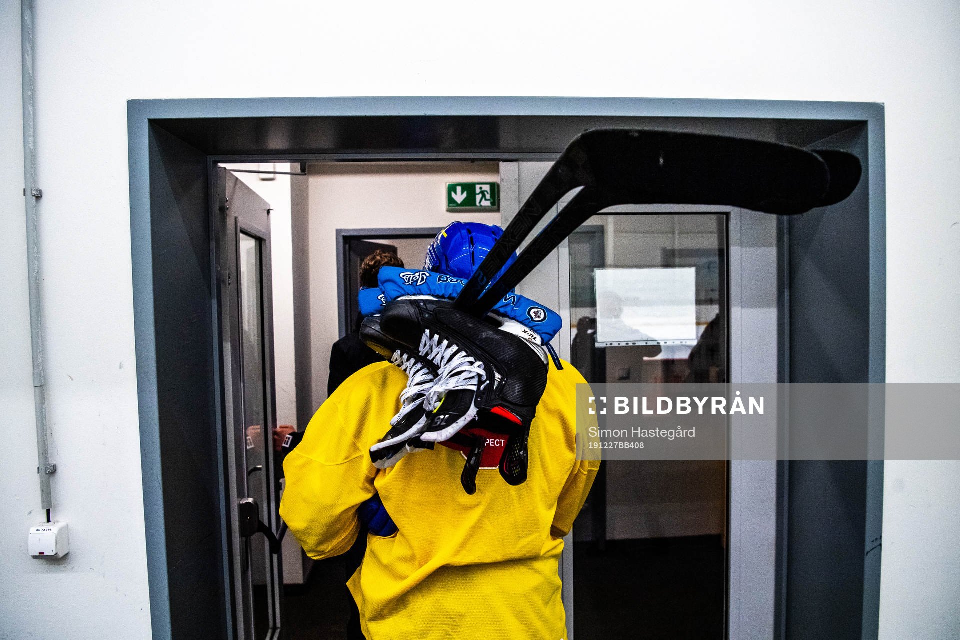 A player of Sweden leaves the rink