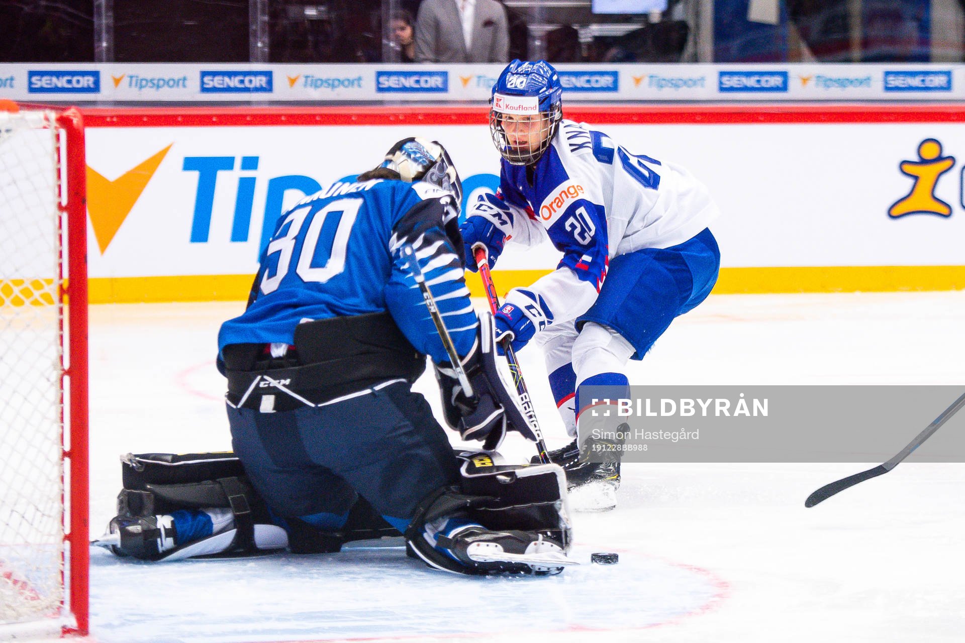 Samuel Knazko of Slovakia against goalkeeper Justus Annunen