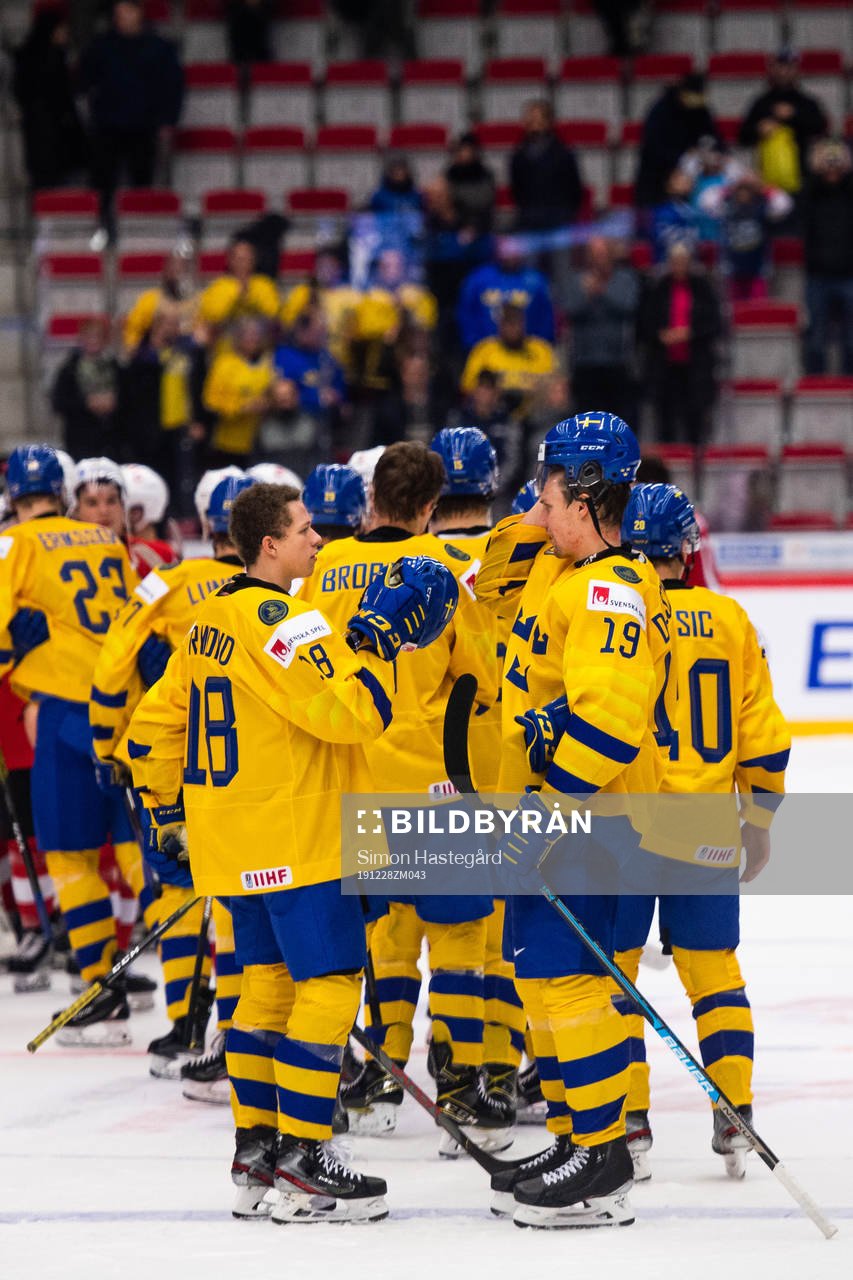 Lucas Raymond and David Gustafsson of Sweden celebrate