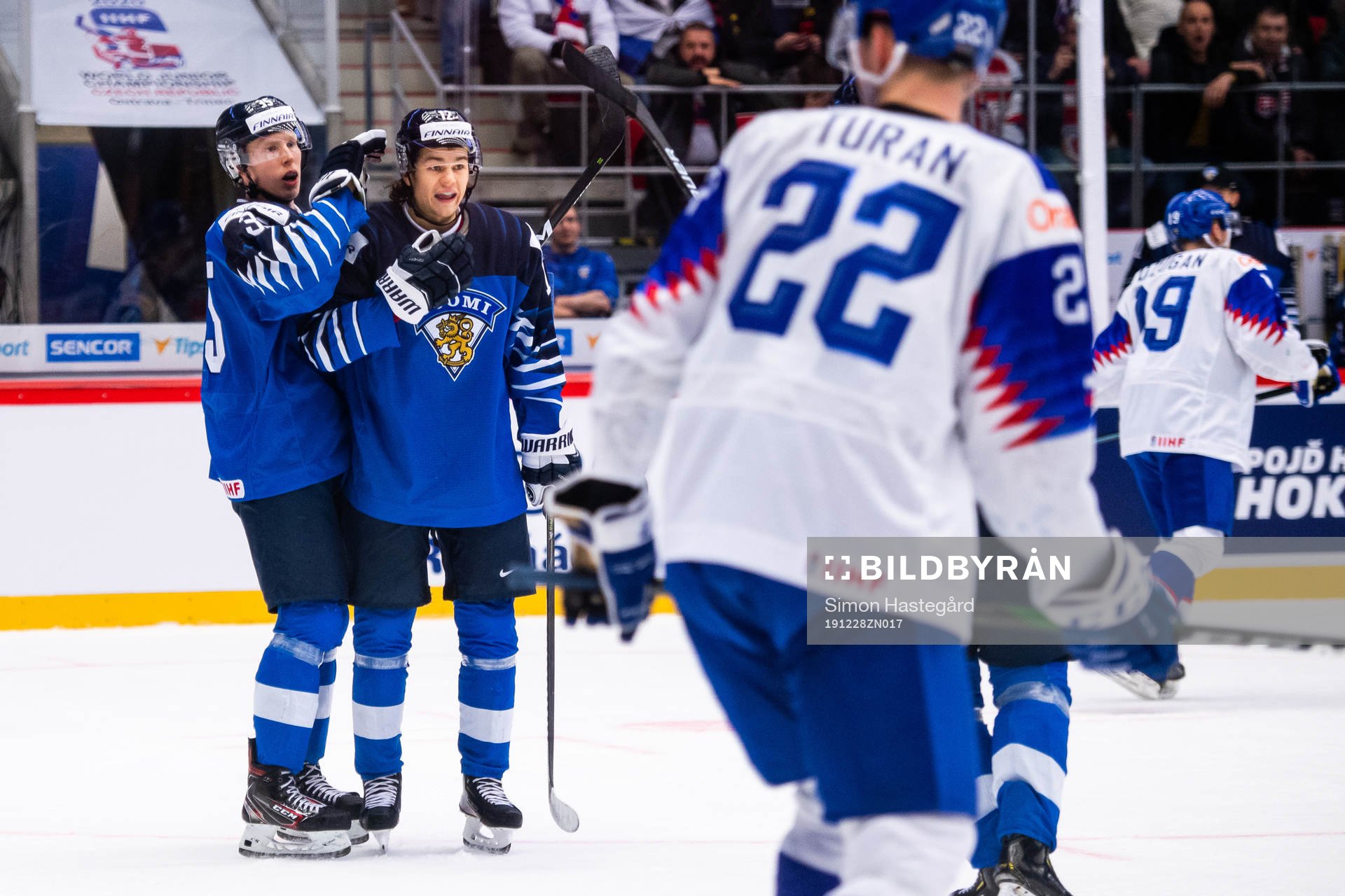 Aku Räty and Eemil Erholtz of Finland celebrate the 6-0
