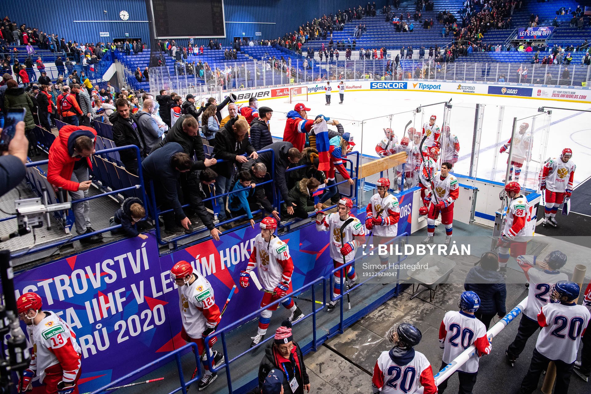 Players of Russia leave the rink