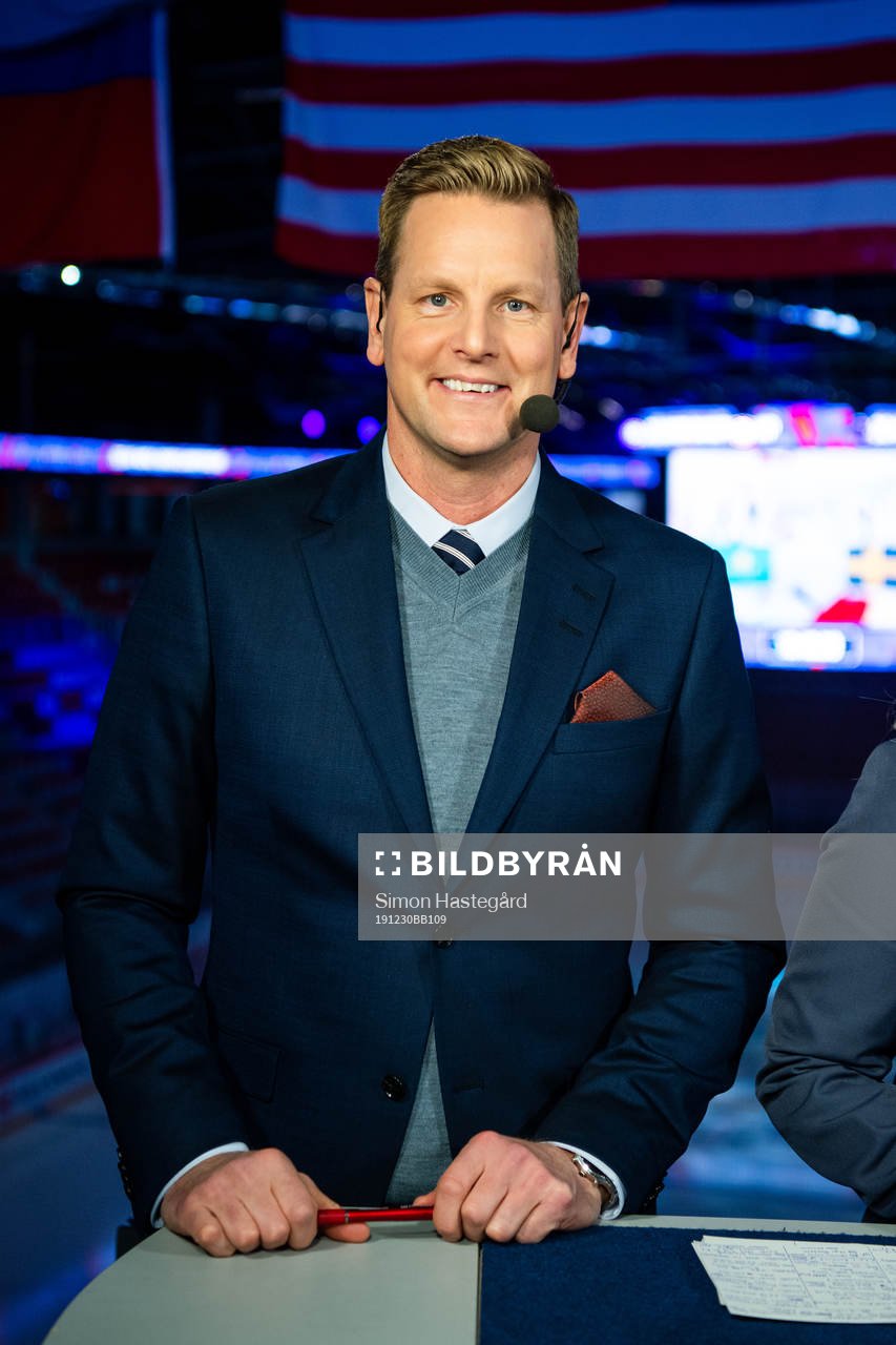 Niklas Jihde of Swedish broadcaster Viasat pose for a
