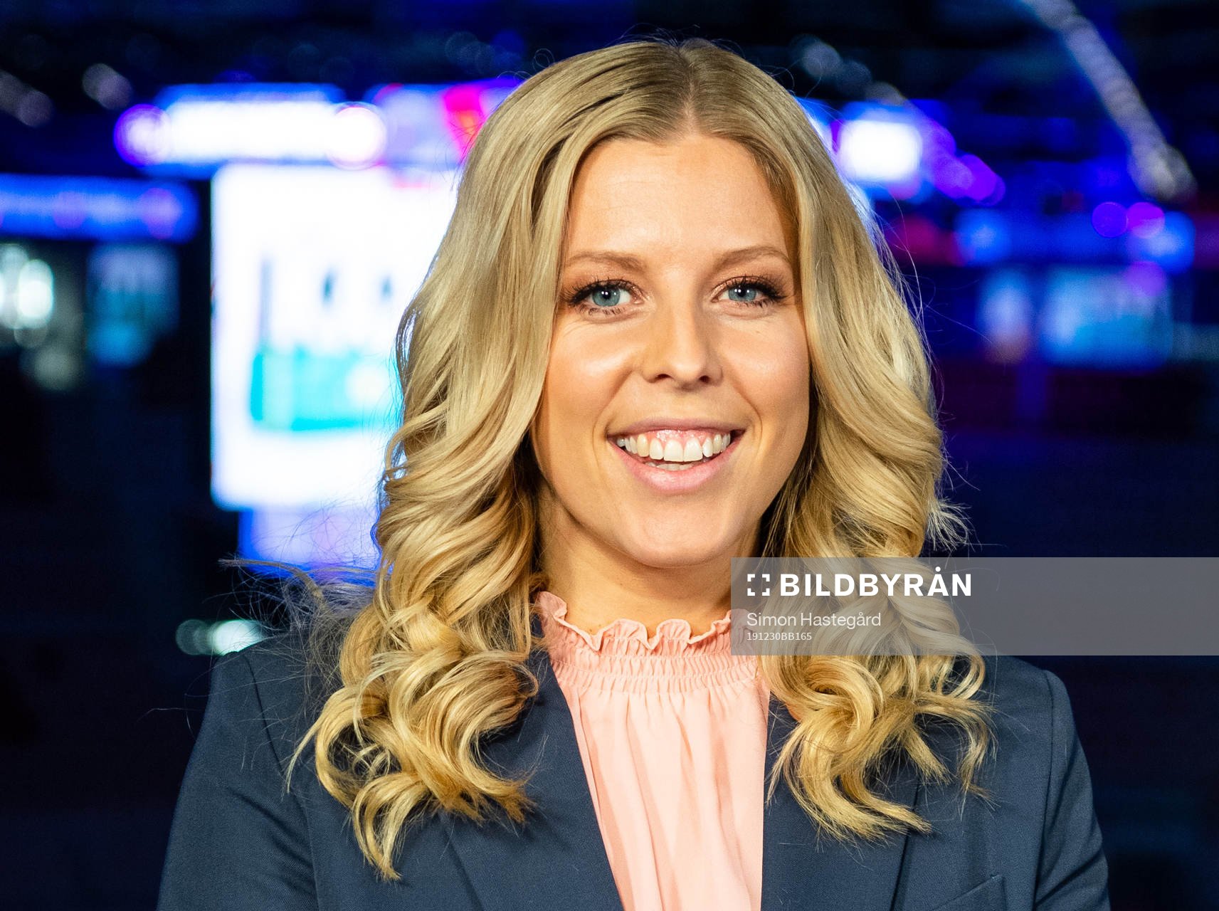 Erica Karlsson of Swedish broadcaster Viasat pose for a