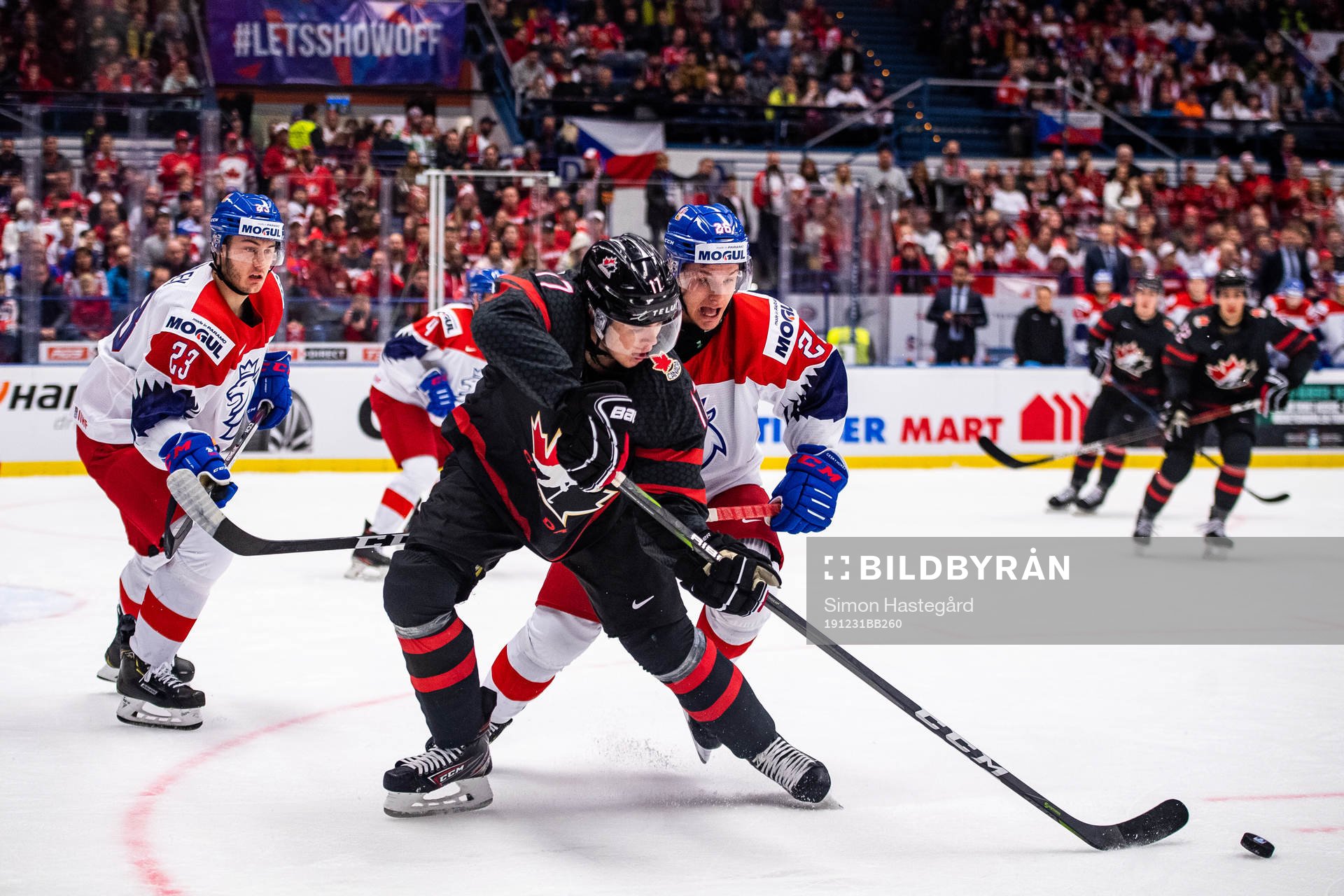Connor McMichael of Canada and Adam Raska of Czech Republic