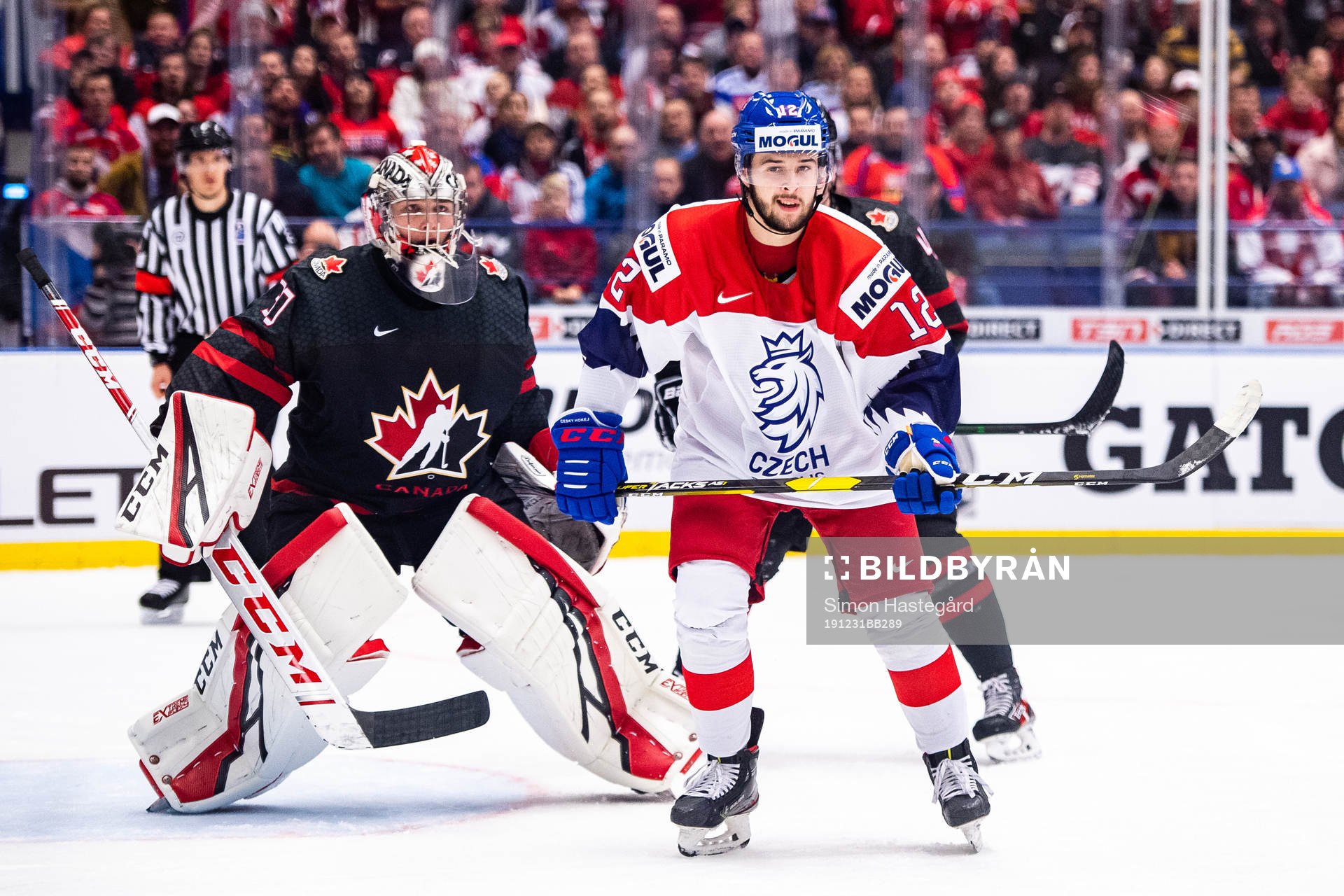 goalkeeper Joel Hofer of Canada and Vojtech Strondala of