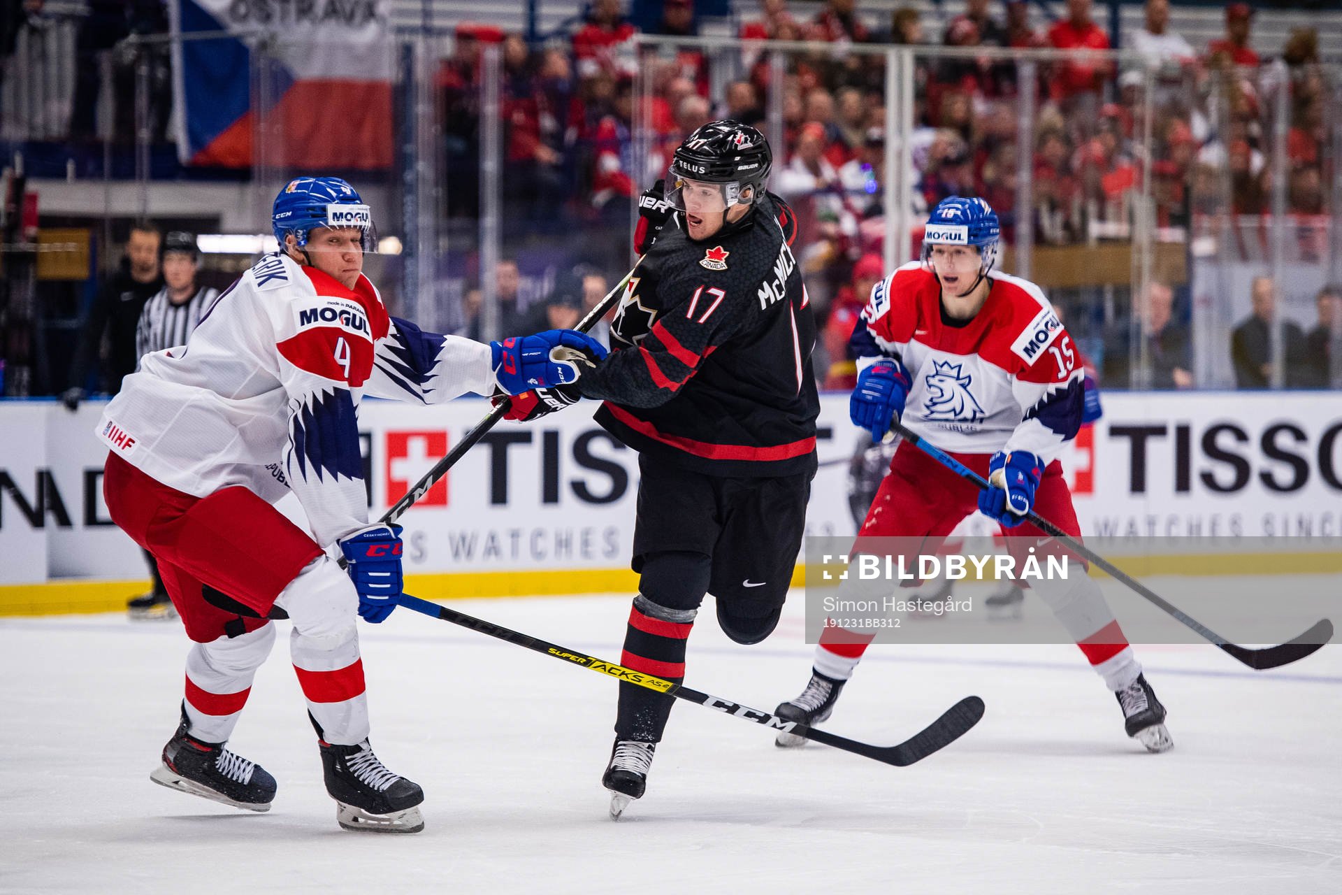 Connor McMichael of Canada against Radek Kucerik and Ondrej