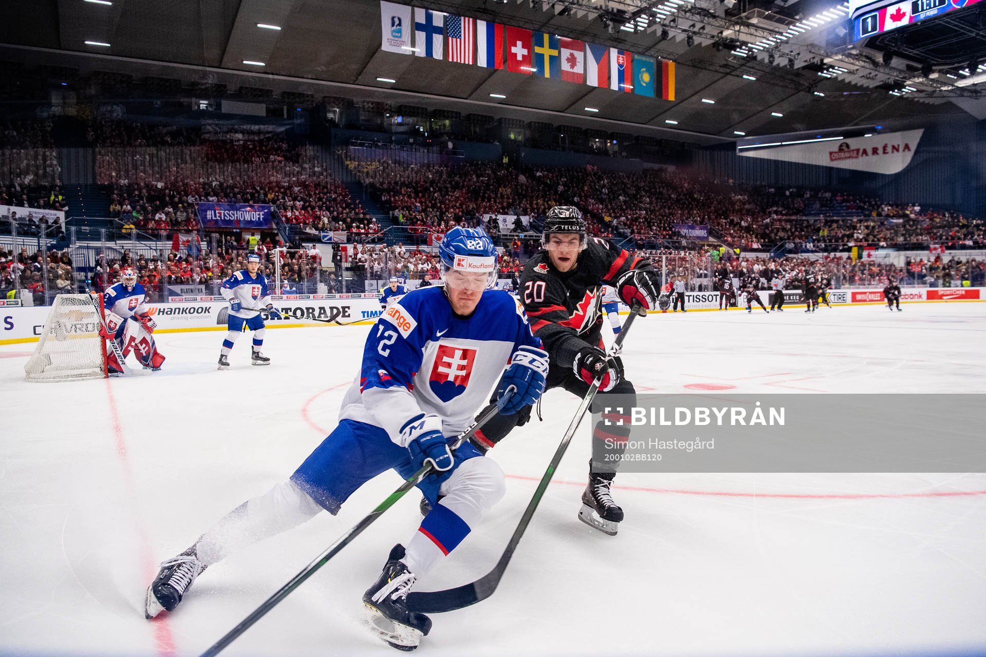 Oliver Turan of Slovakia and Dawson Mercer of Canada