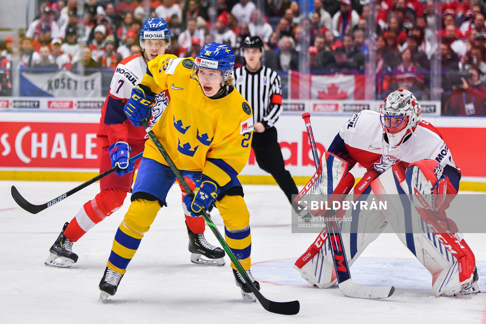 Karl Henriksson of Sweden and goalkeeper Lukas Dostal of
