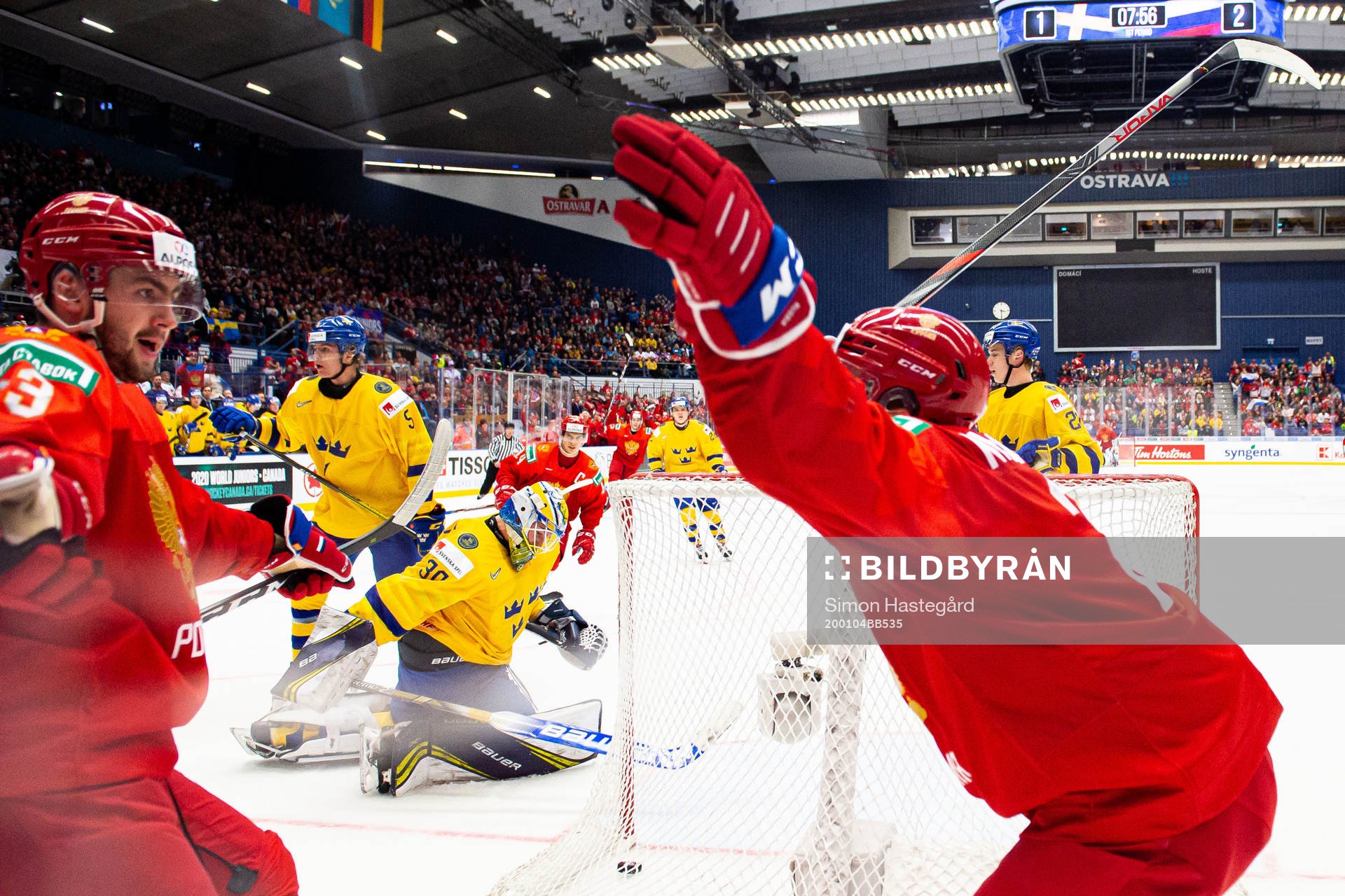 Philip Broberg and goalkeeper Hugo Alnefelt of Sweden look