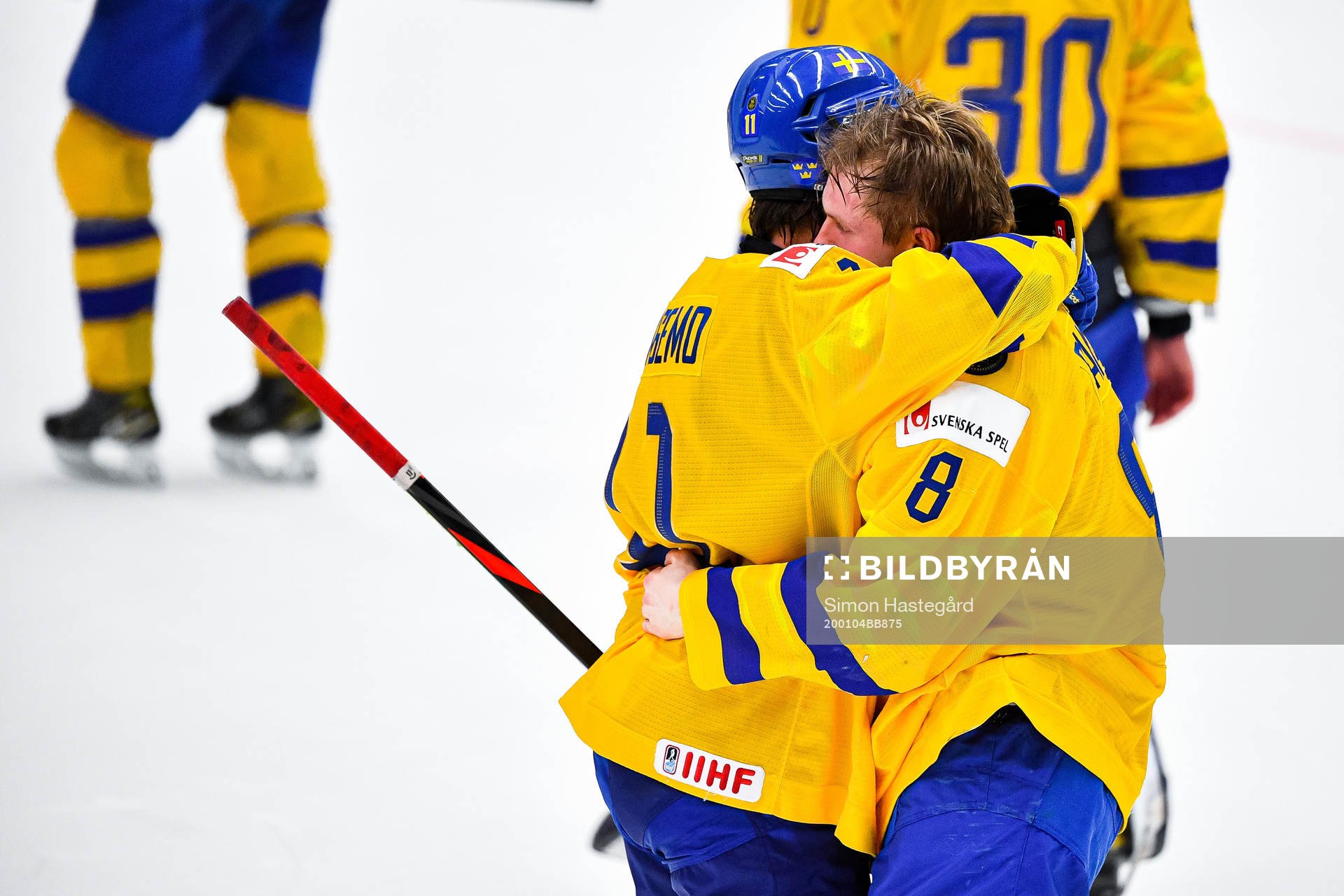Samuel Fagemo and Rasmus Sandin of Sweden look dejected