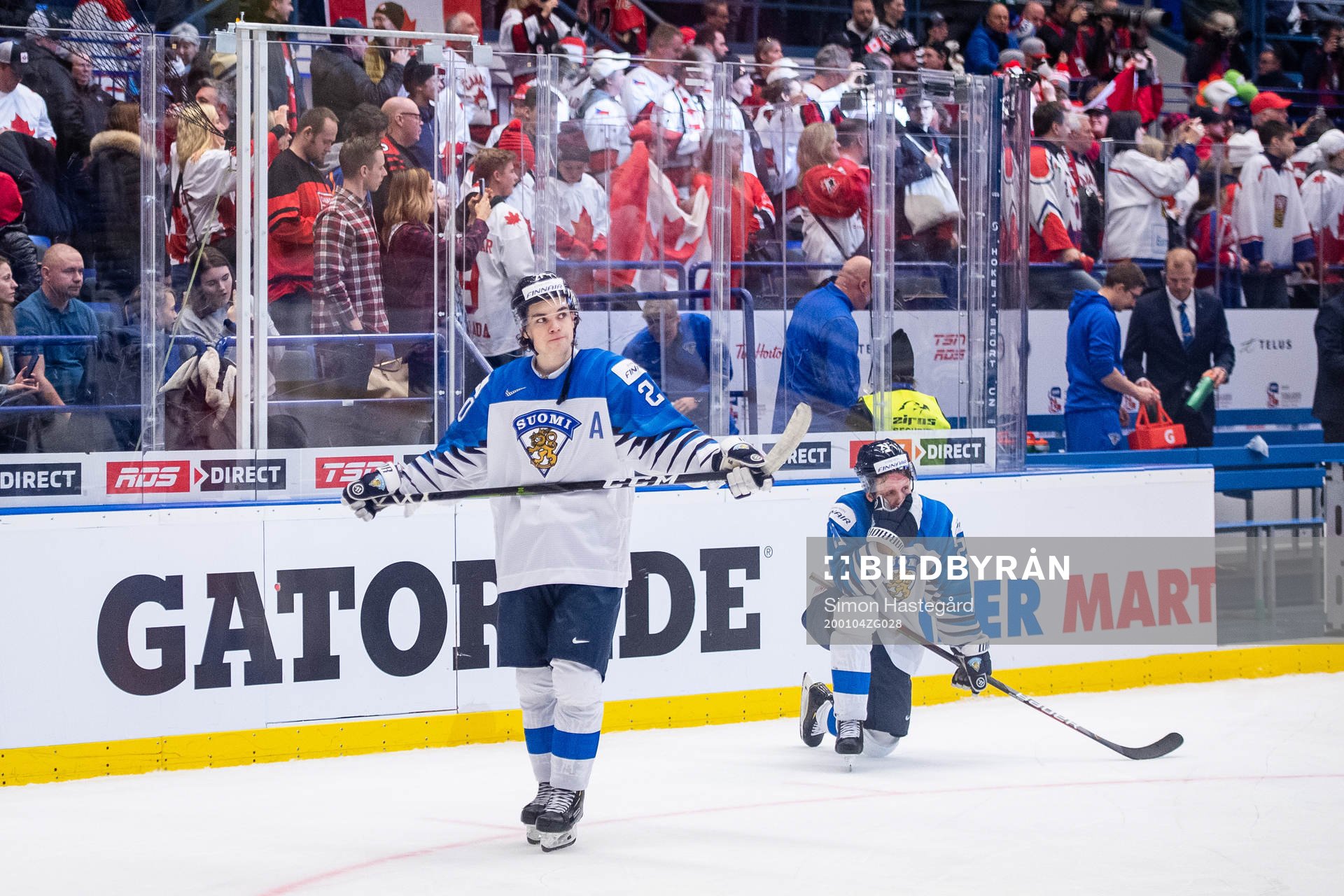 Matias Macceli and Patrik Puistola of Finland looks dejected