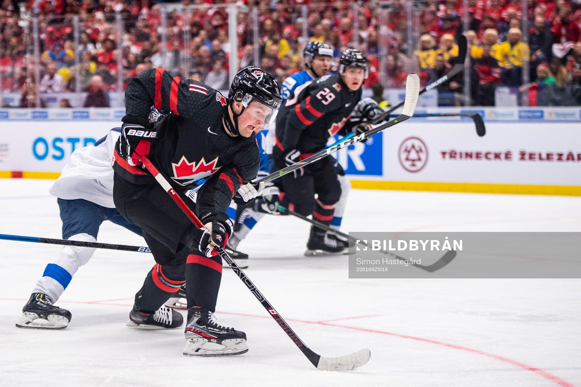 Alexis Lafreniere of Canada scores the 2-0 goal