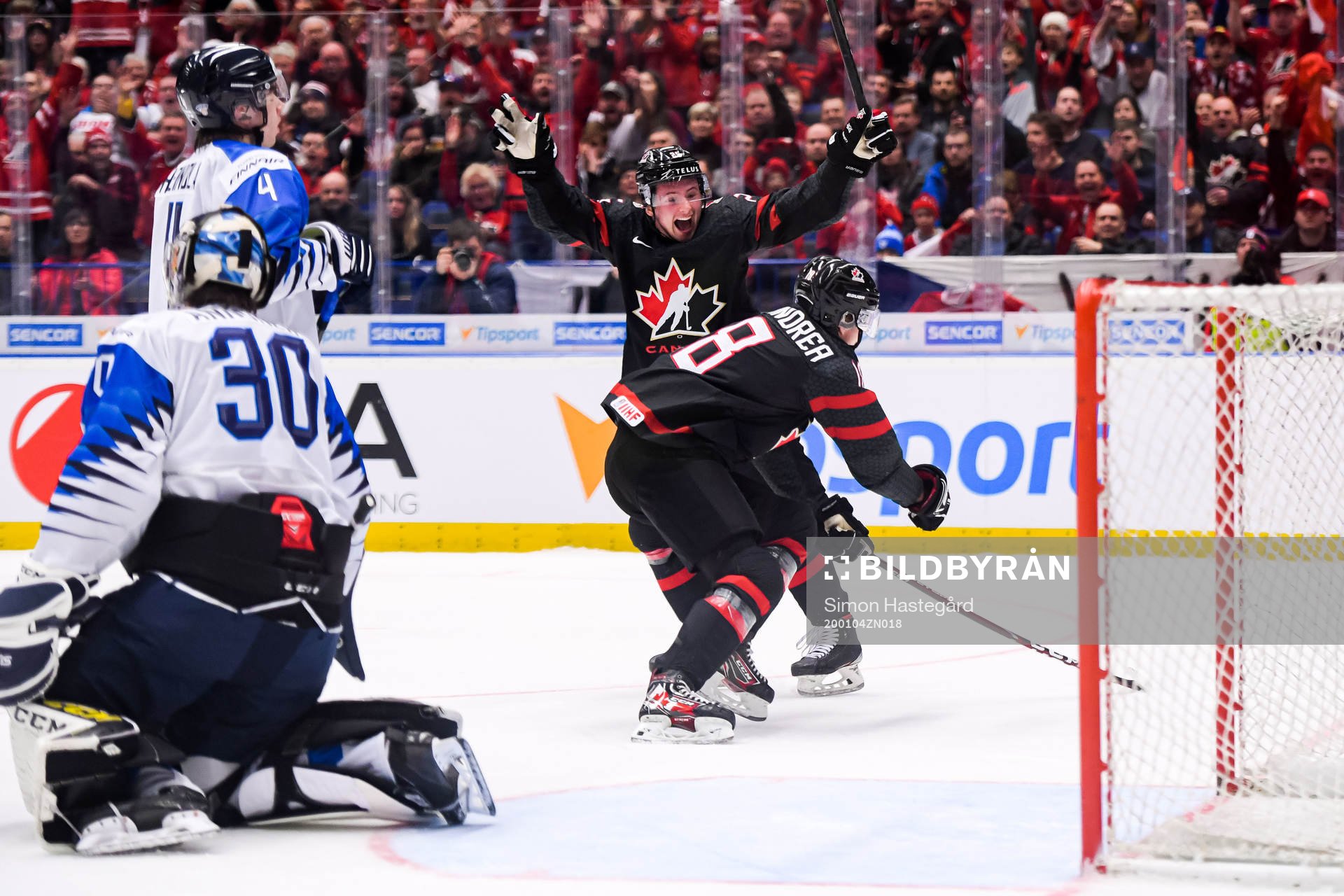 Aidan Dudas and Ty Dellandrea of Canada celebrate