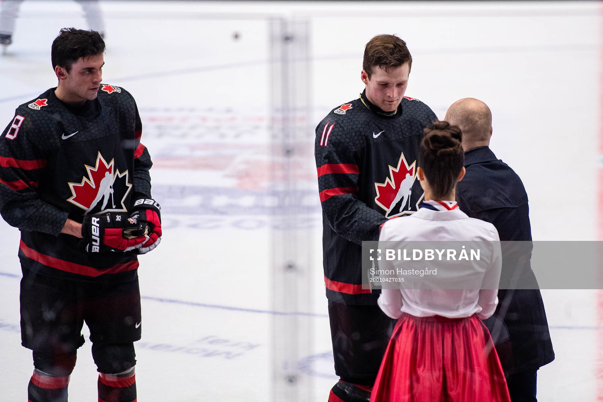 Liam Foudy and Alexis Lafreniere of Canada