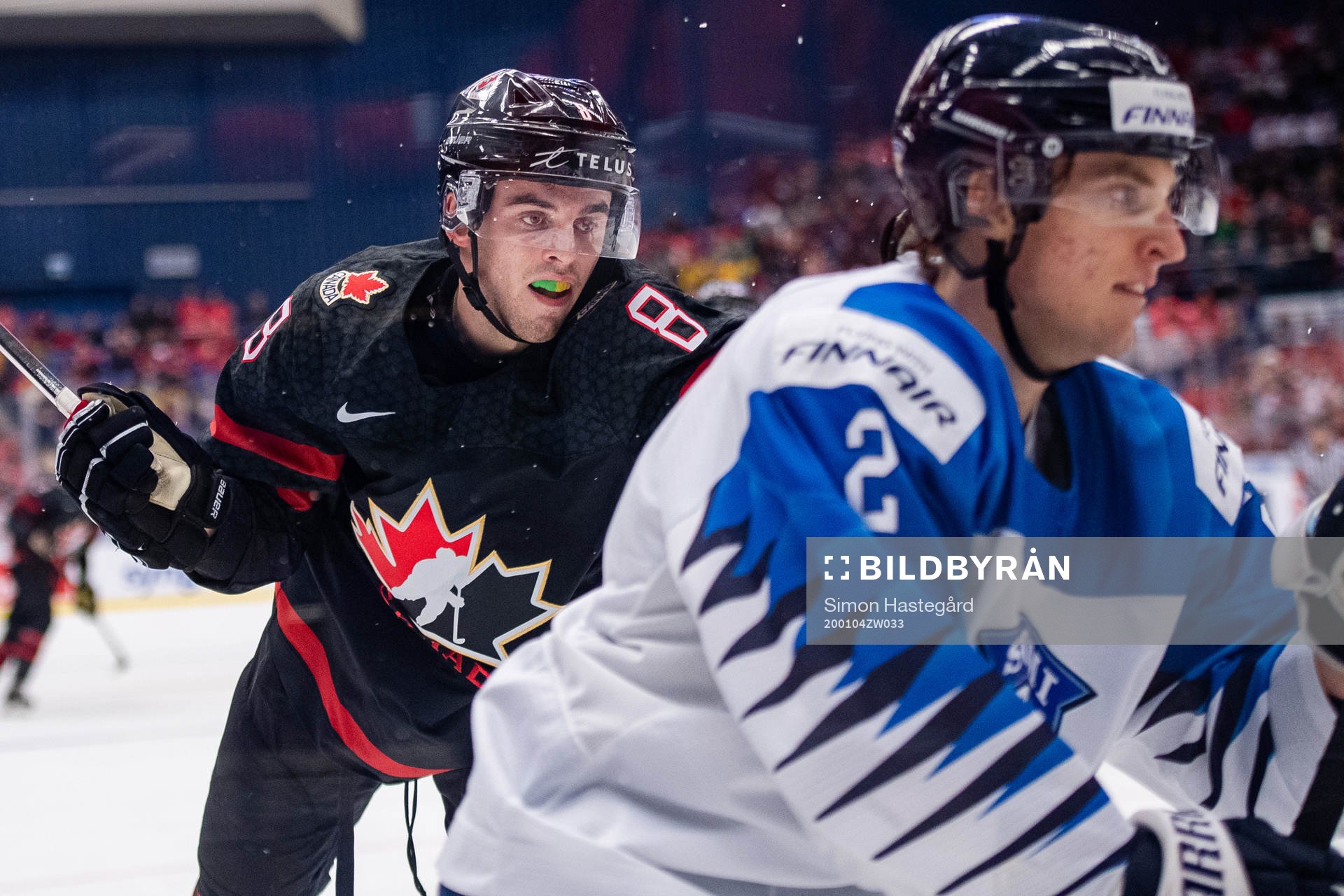 Liam Foudy of Canada and Santeri Tatakka of Finland