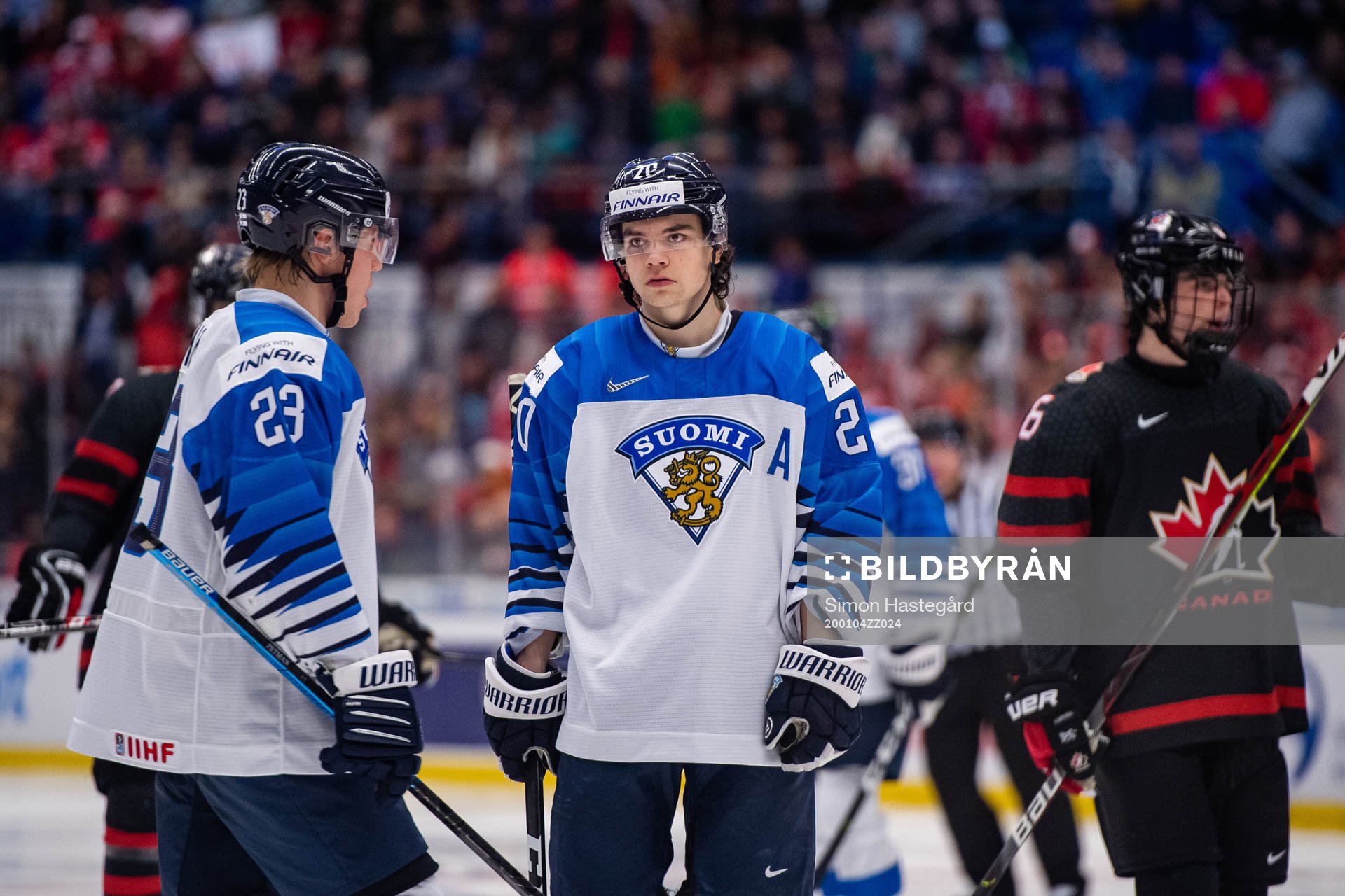 Ville Petman and Matias Macceli of Finland look dejected
