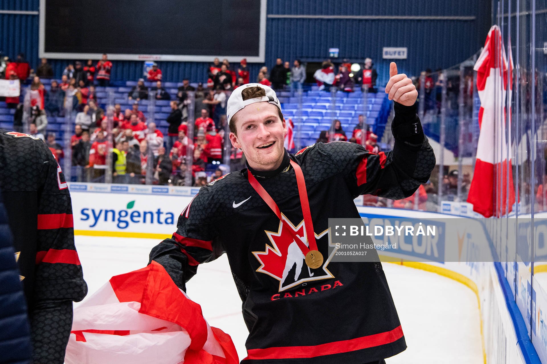 Alexis Lafreniere of Canada celebrates