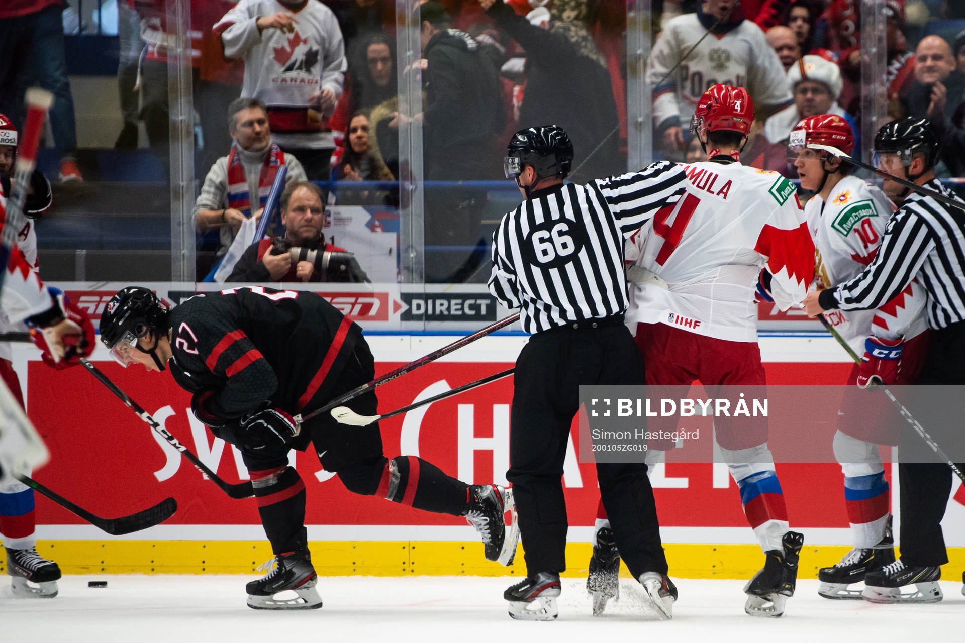 Barrett Hayton of Canada and Yegor Zamula of Russia