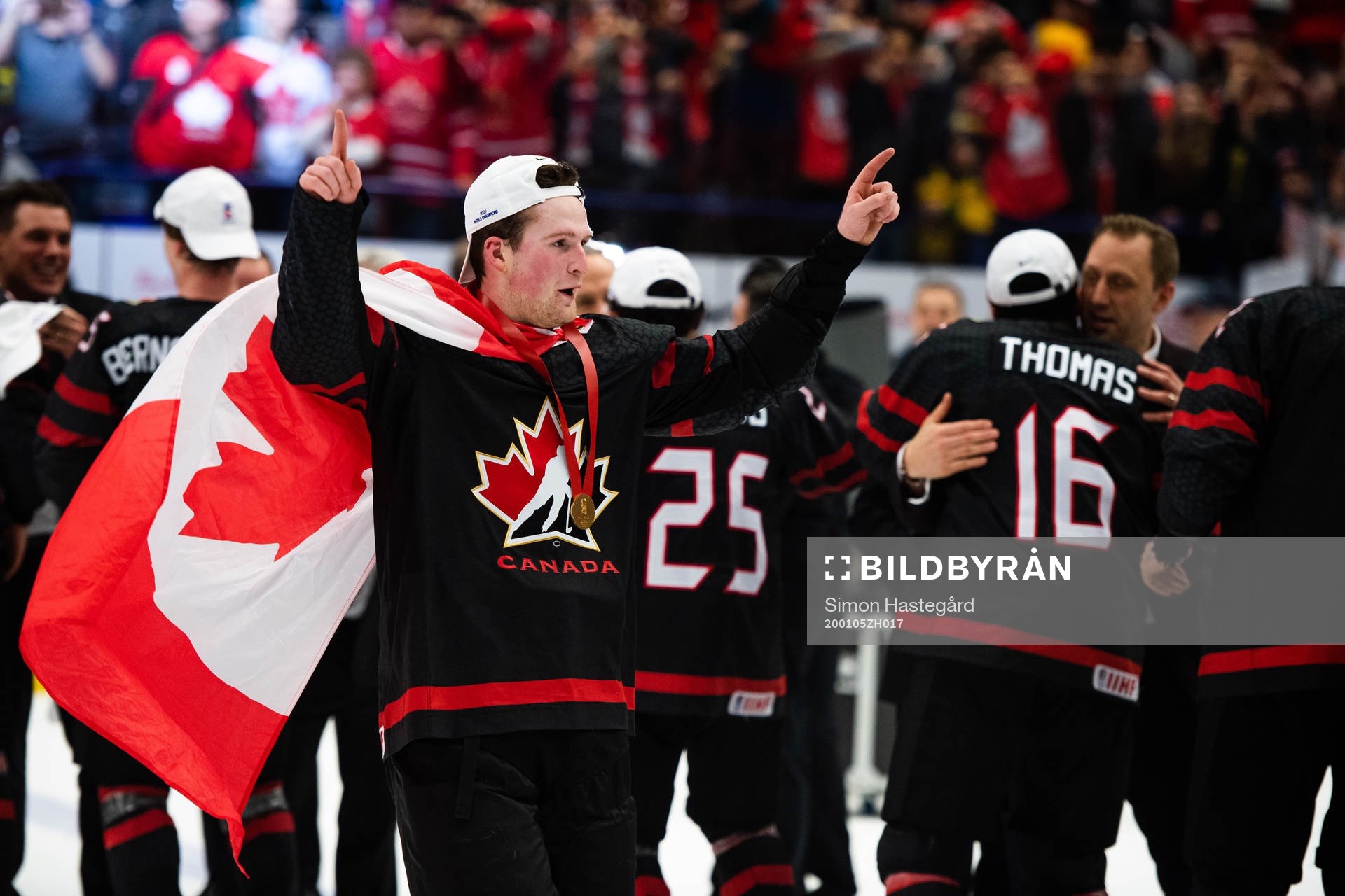 Alexis Lafreniere of Canada celebrates