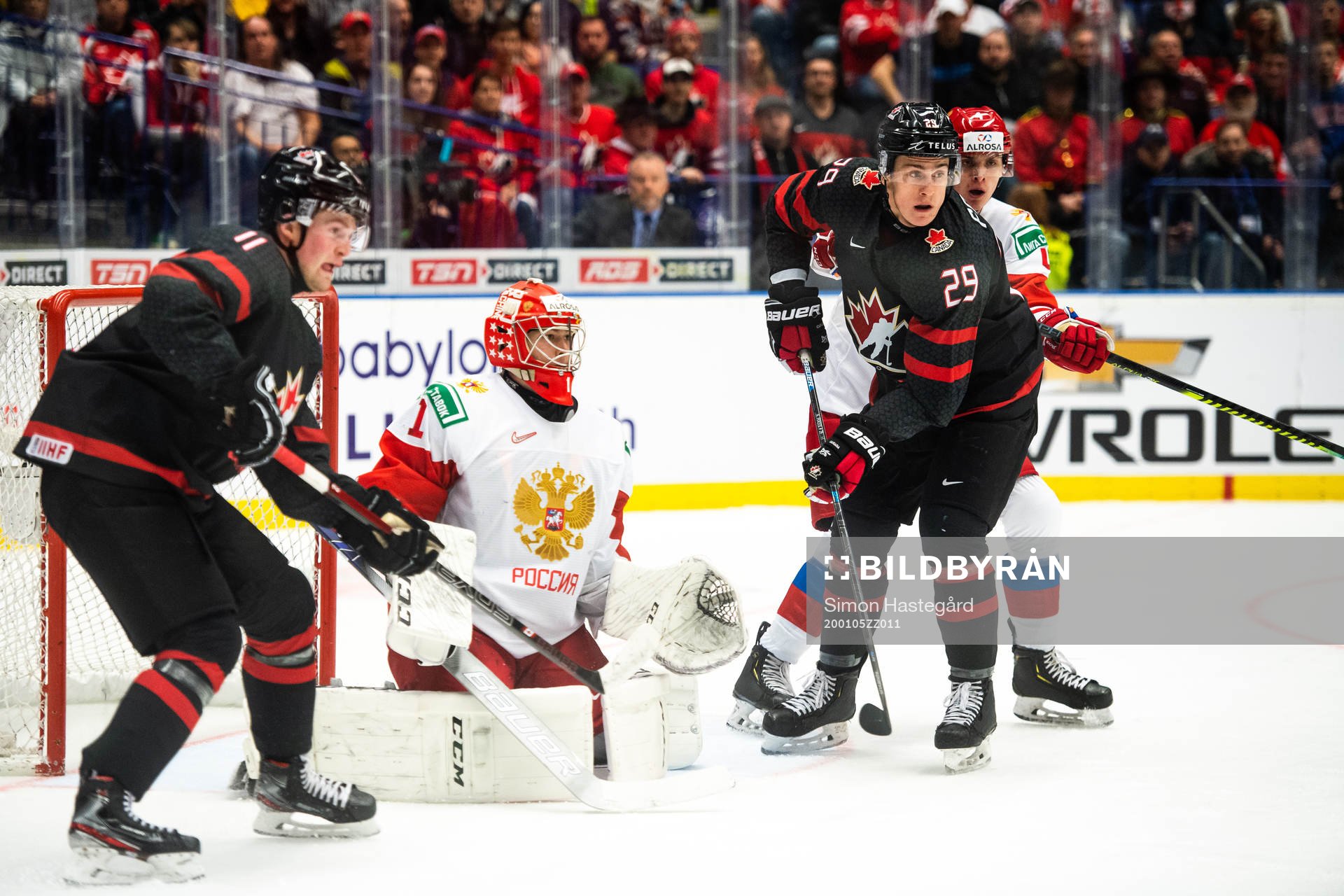 Alexis Lafreniere and Nolan Foote of Canada against