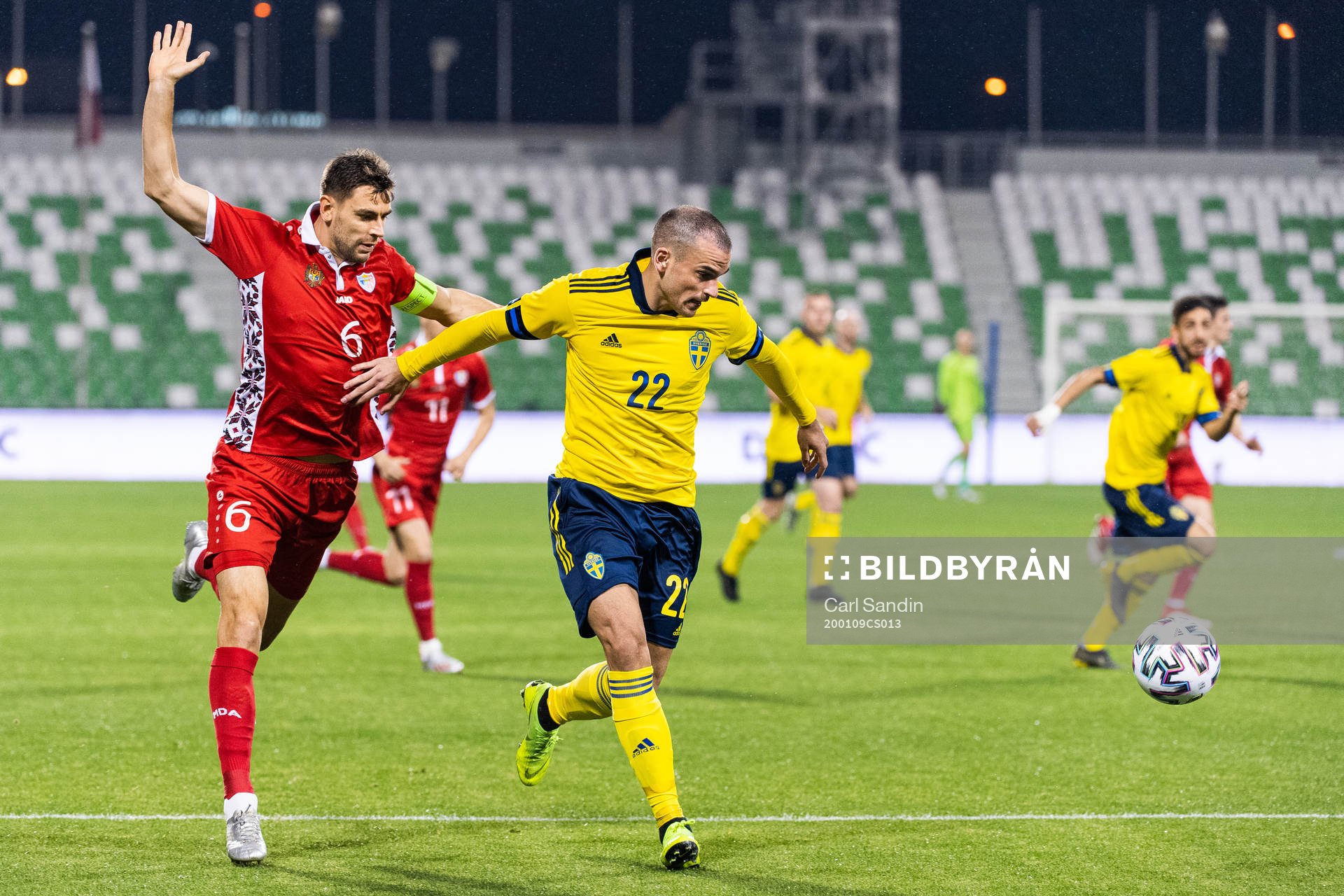 Igor Armas of Moldova and Dino Islamovic of Sweden compete for the ball during the international friendly football match between Sweden and Moldova on January 9, 2020 in Doha.