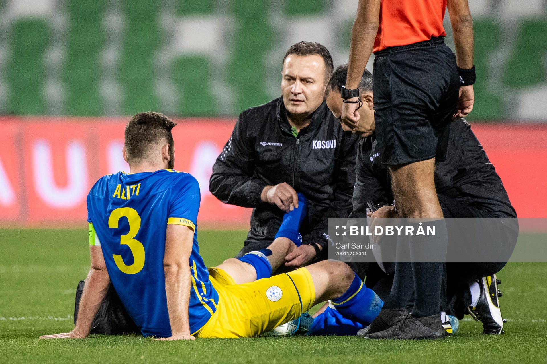 Fidan Aliti of Kosovo receives medical attention