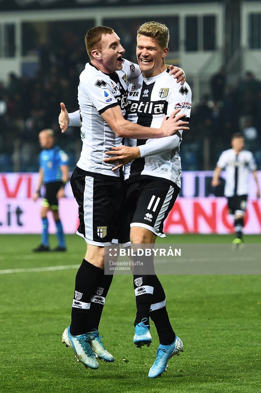 Dejan Kulusevski and Andreas Cornelius of Parma celebrate