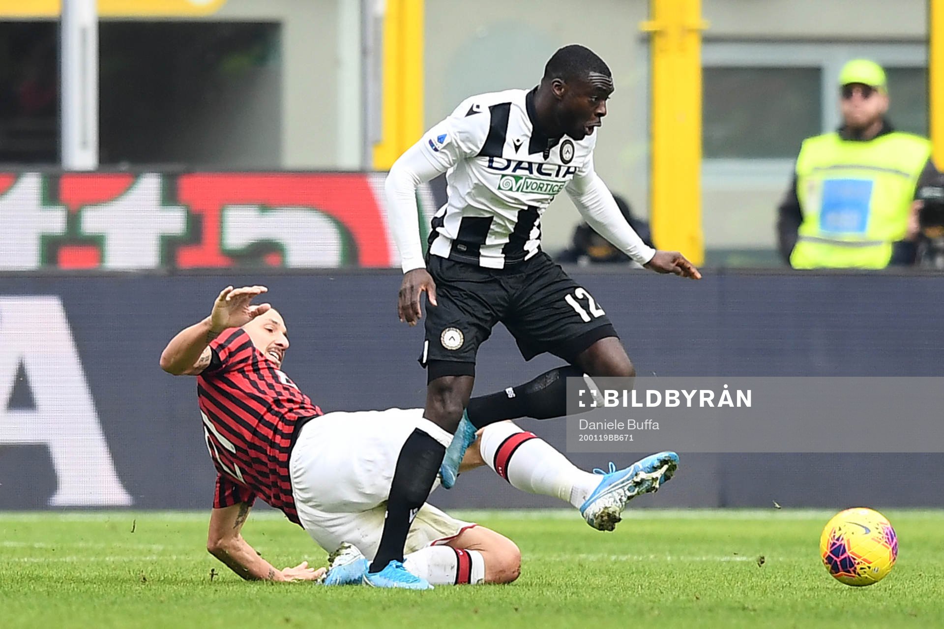 Zlatan Ibrahimovic of AC Milan and Ken Sena of Udinese