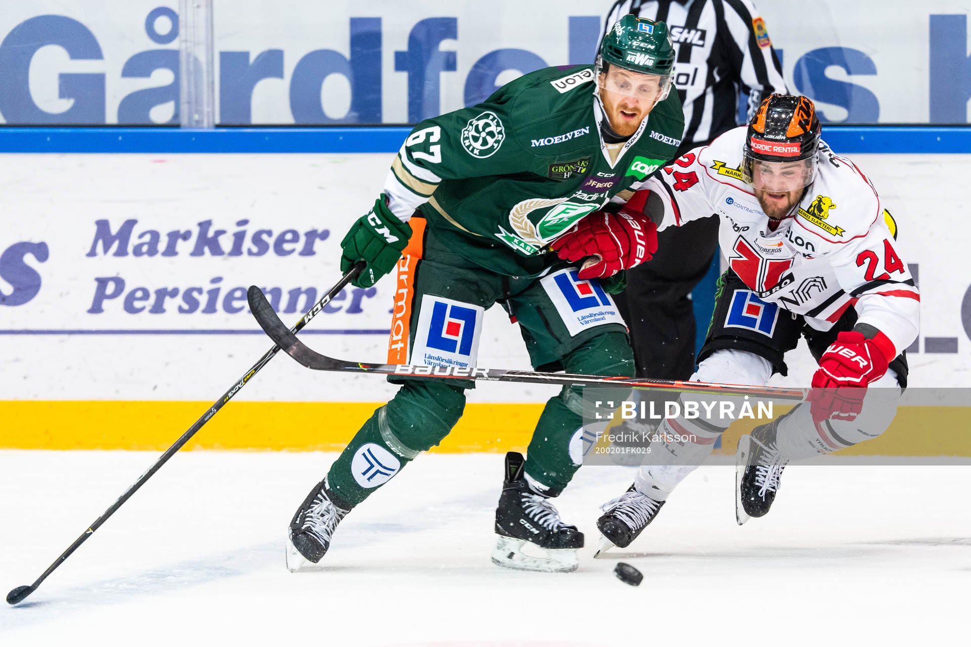 Färjestads Pontus Widerström och Örebros Aaron Irving i