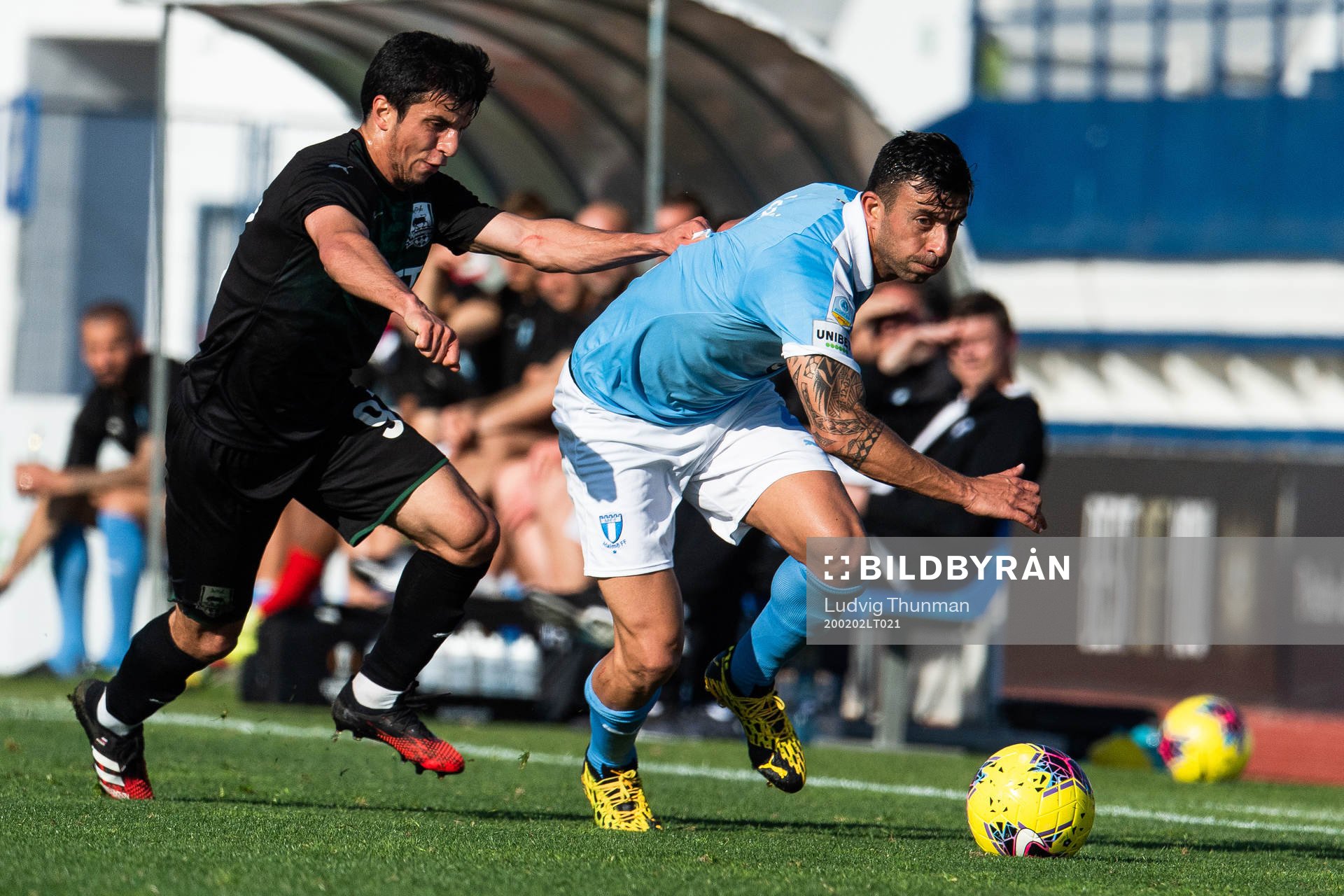 Aleksandr Martynovich of Krasnodar and Behrang Safari of Malmö FF compete for the ball during the friendly match between Malmö FF and Krasnodar on February 2, 2020 in Marbella.