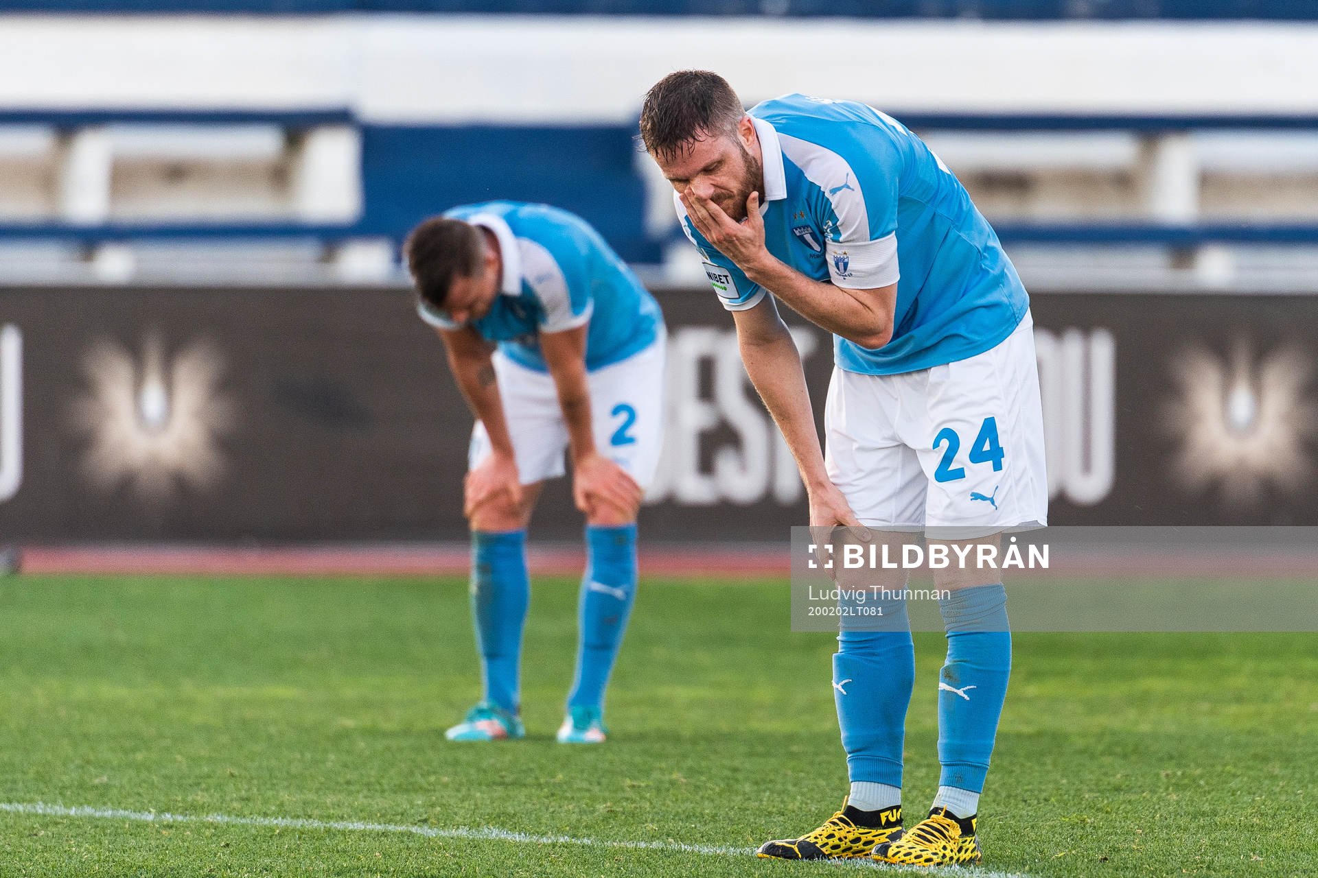 Eric Larsson and Lasse Nielsen of Malmö FF look dejected