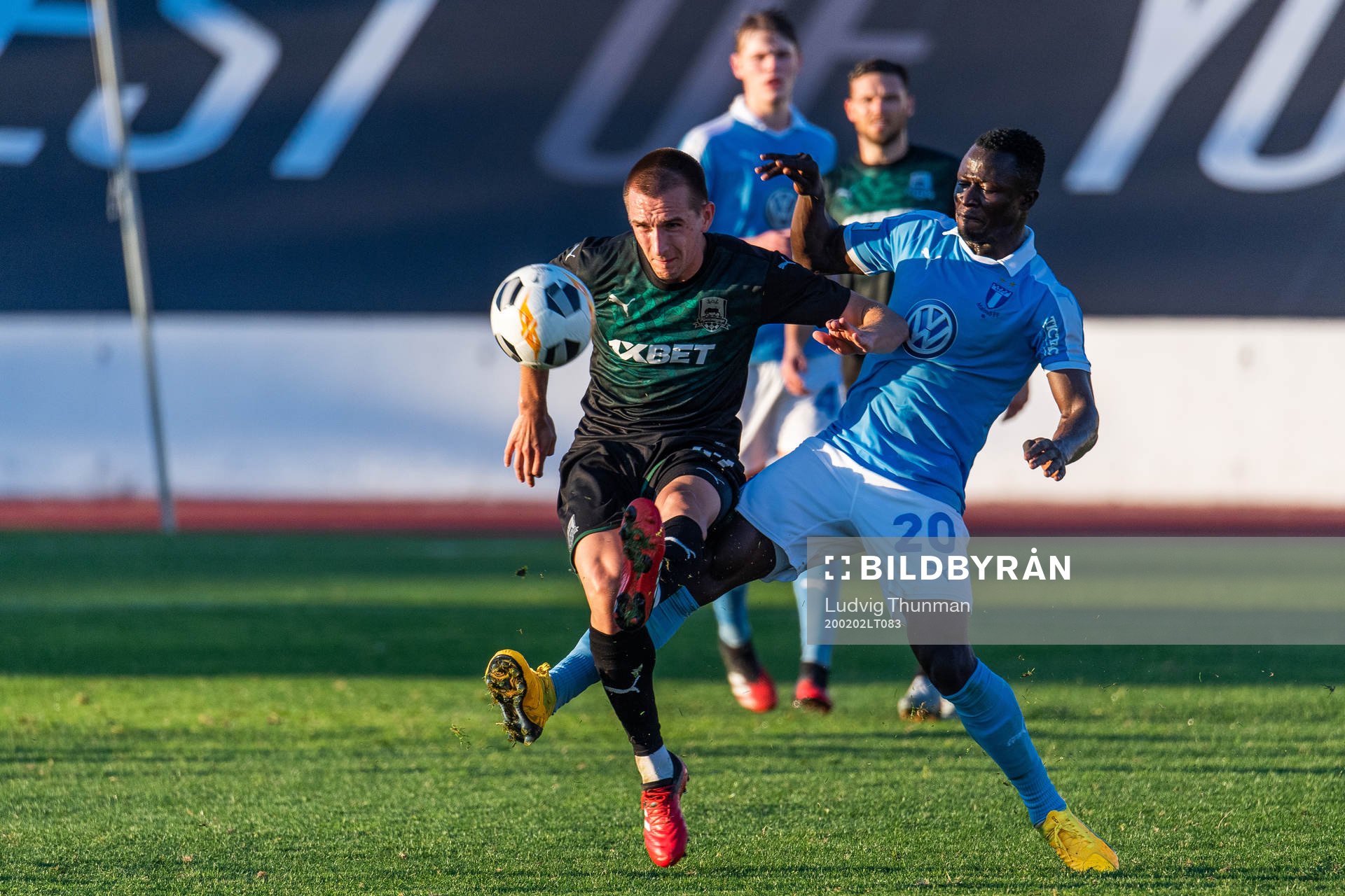 Illya Martynov of Krasnodar and Bonke Innocent of Malmö FF