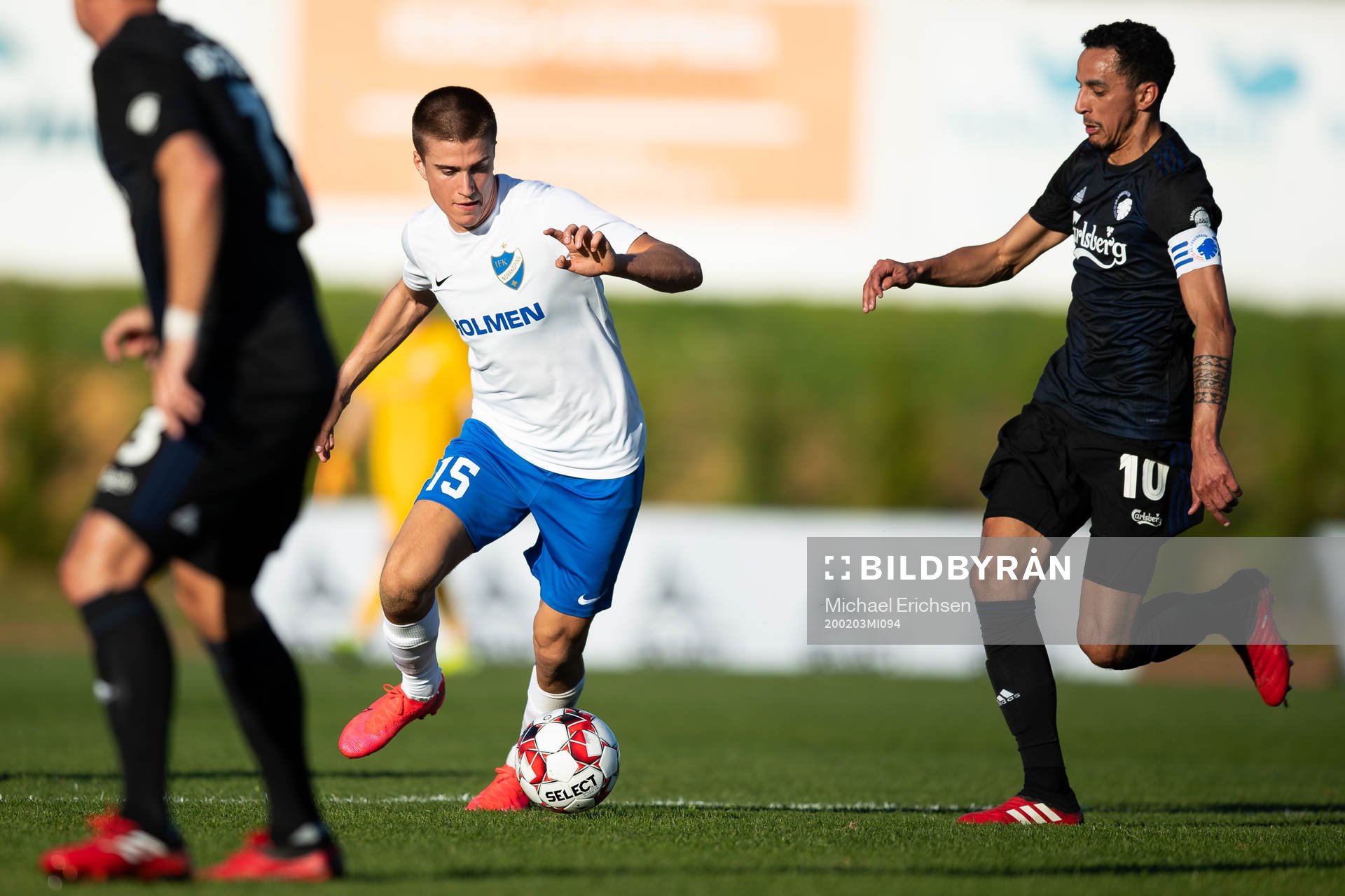 Carl Björk of Norrköping and Carlos Zeca of Köpenhamn